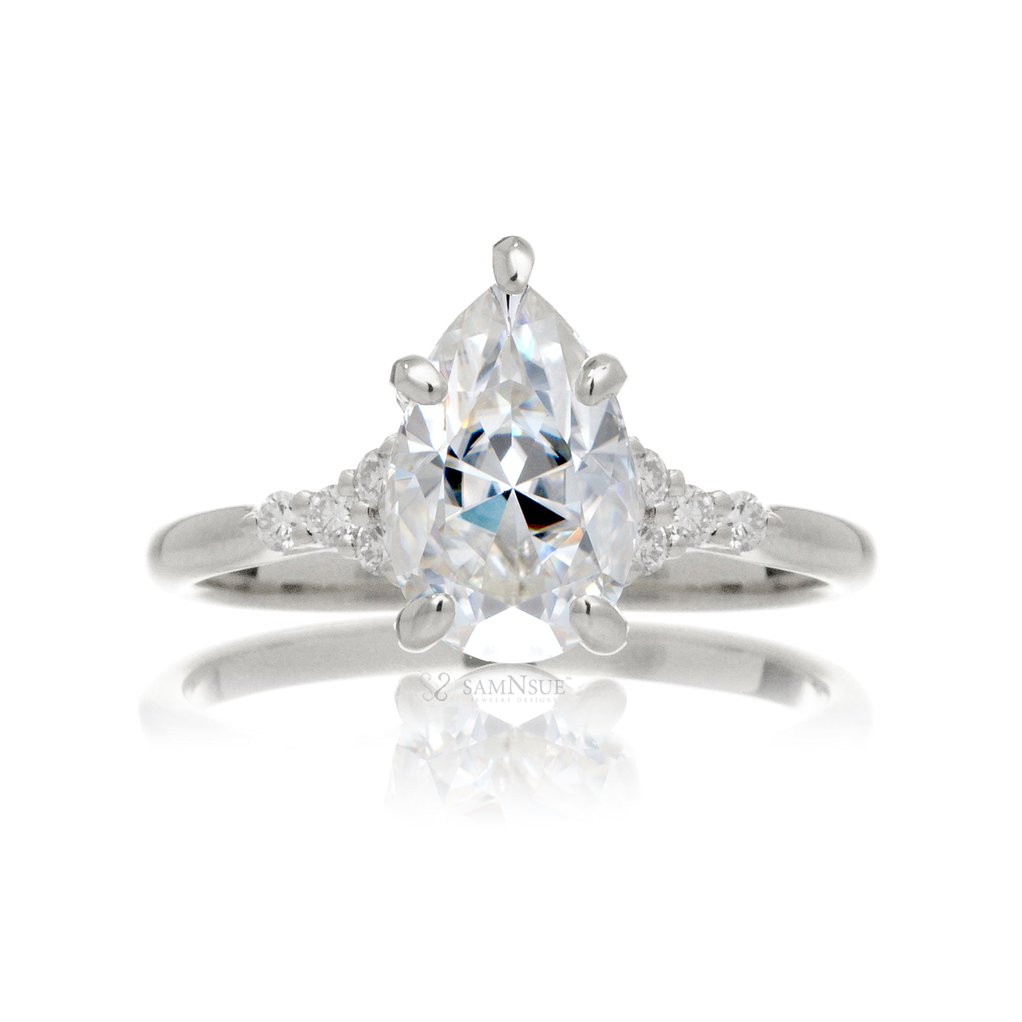 Pear moissanite ring with diamond accent on white gold - the Chloe