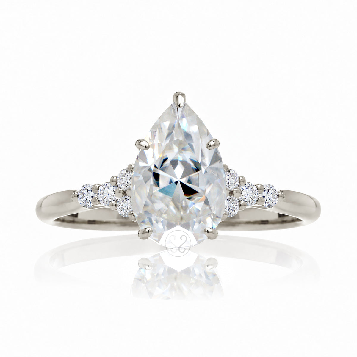 Pear moissanite ring with diamond accent on white gold - the Chloe