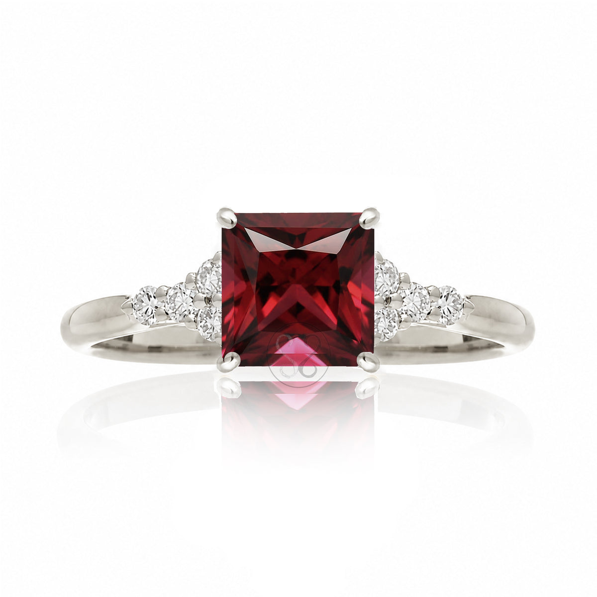 Ruby ring with princess cut and diamond accent in white gold