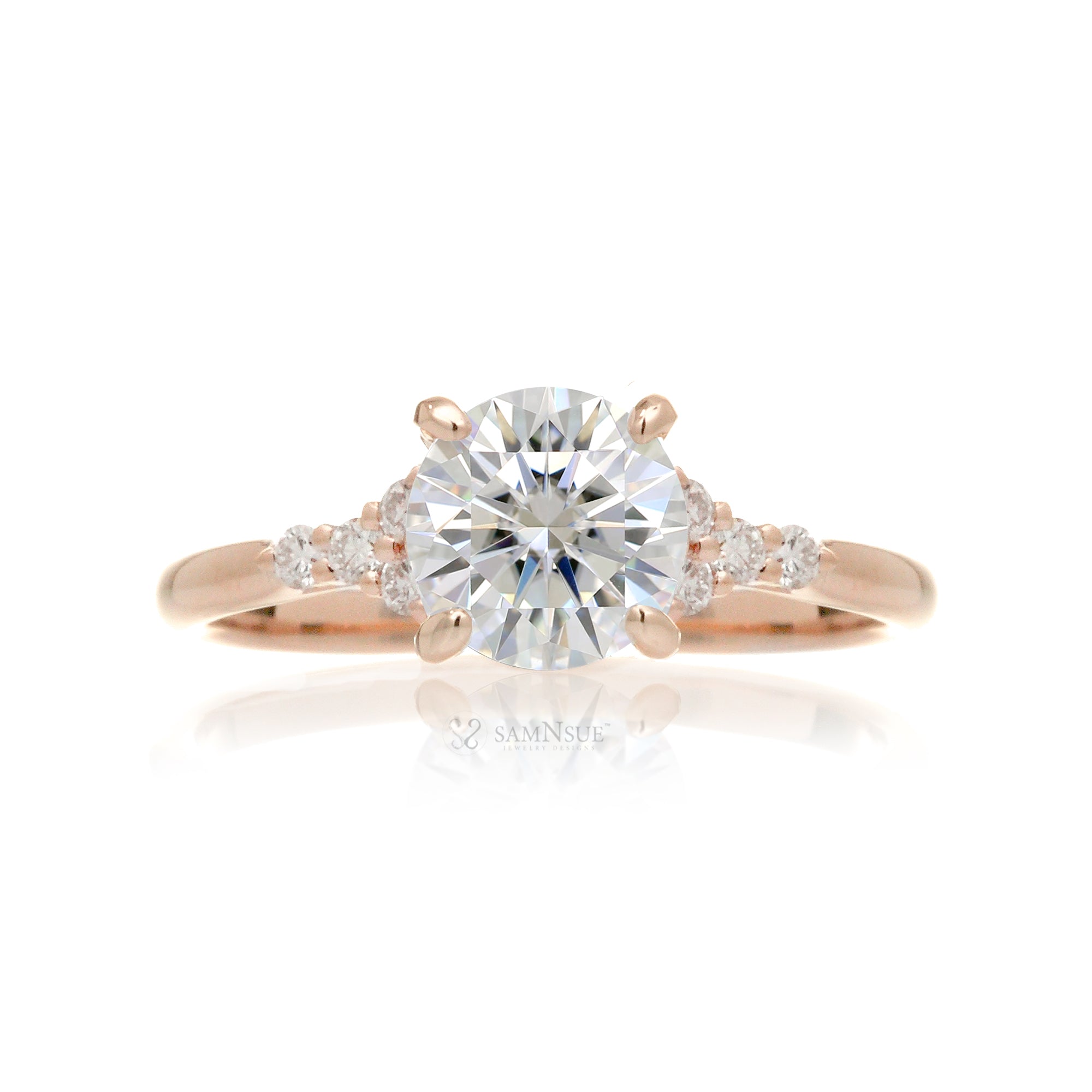 Round brilliant cut diamond engagement ring with rounded band in rose gold