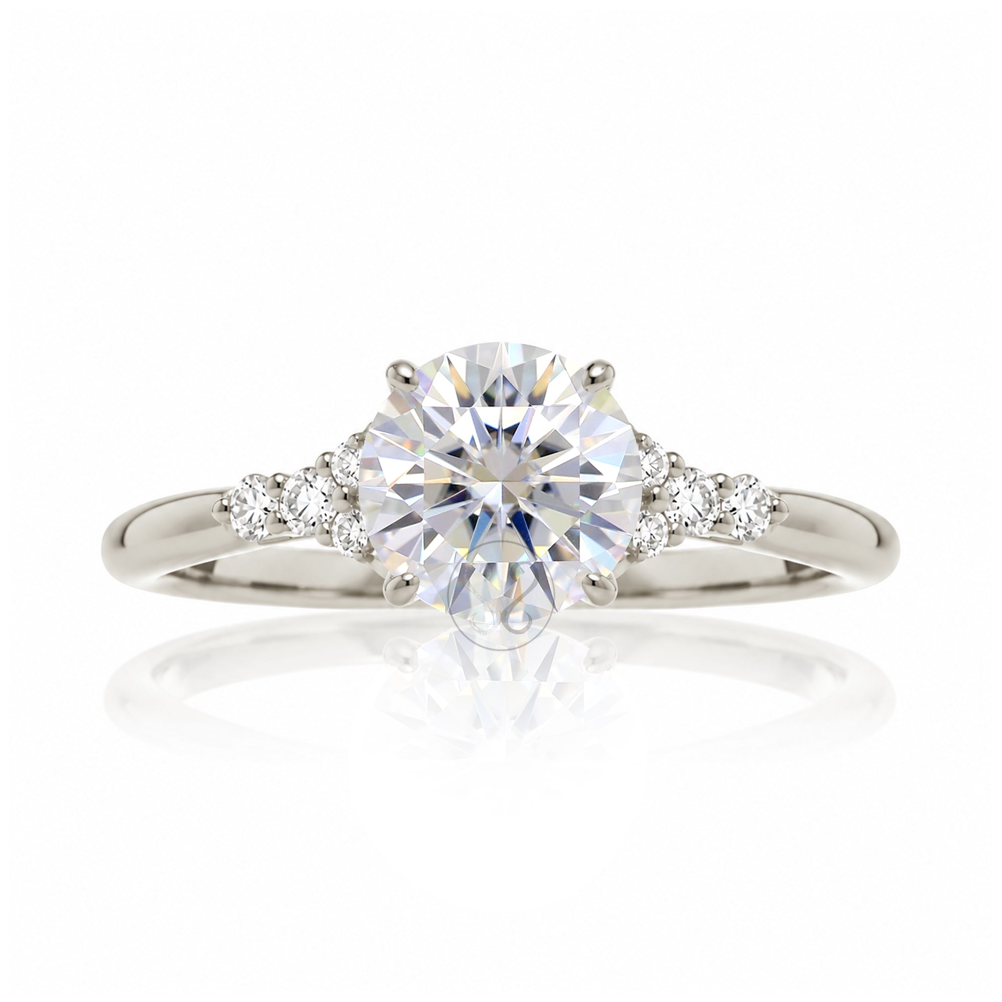 Round brilliant cut diamond engagement ring with rounded band in white gold