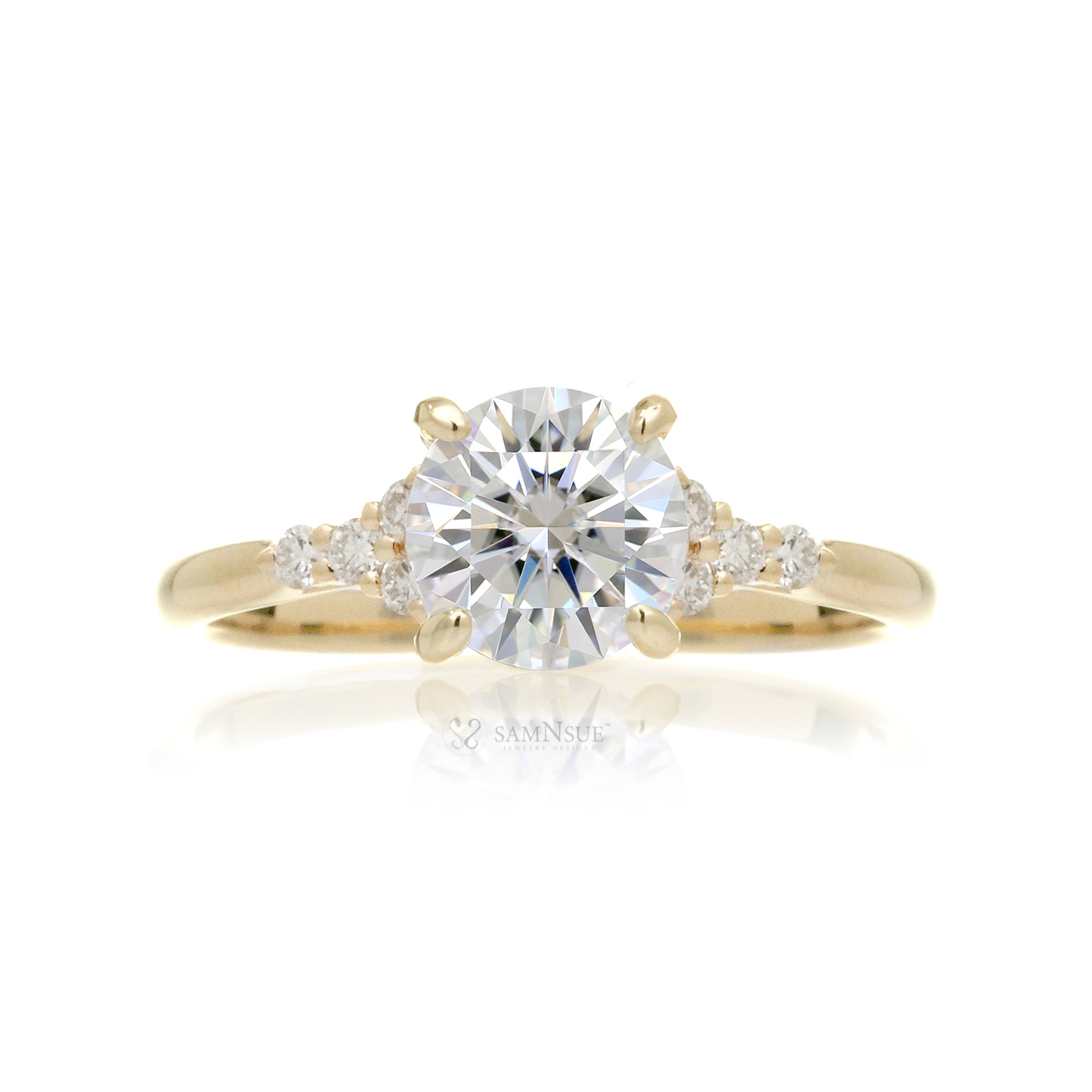 Round brilliant cut diamond engagement ring with rounded band in yellow gold