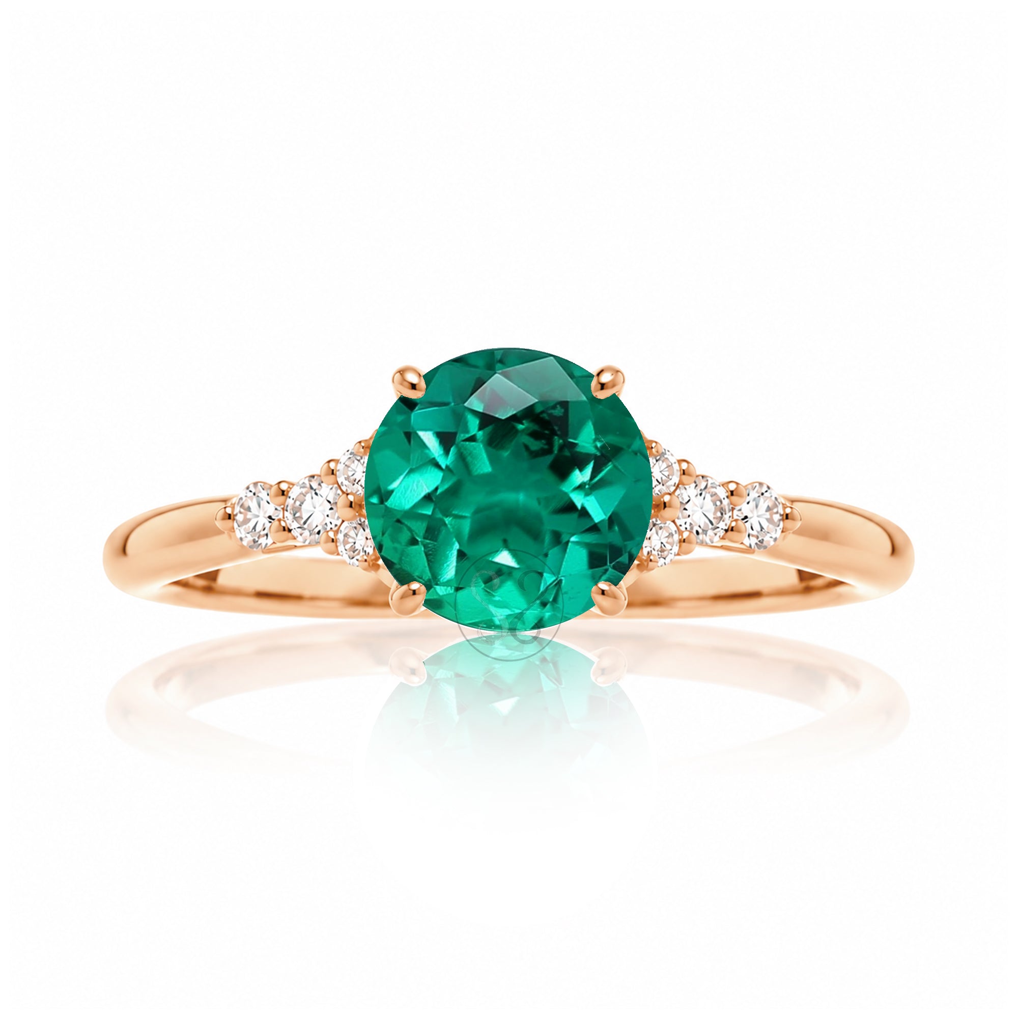 Round cut green emerald and diamond ring in rose gold