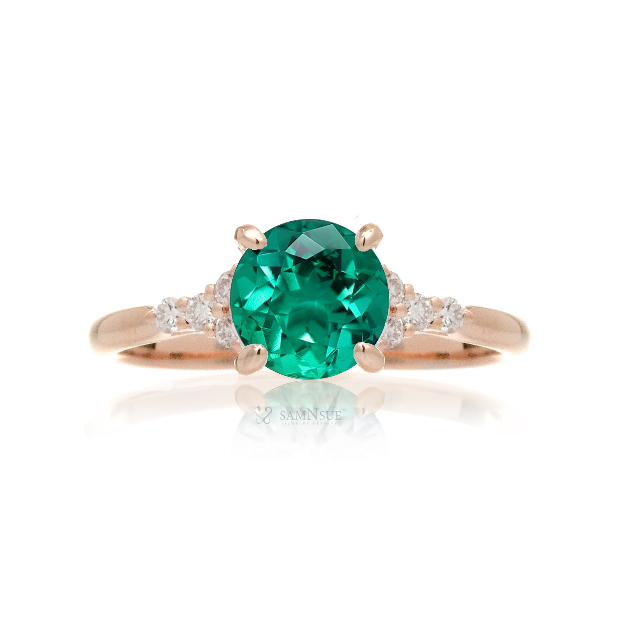 Round cut green emerald and diamond ring in rose gold