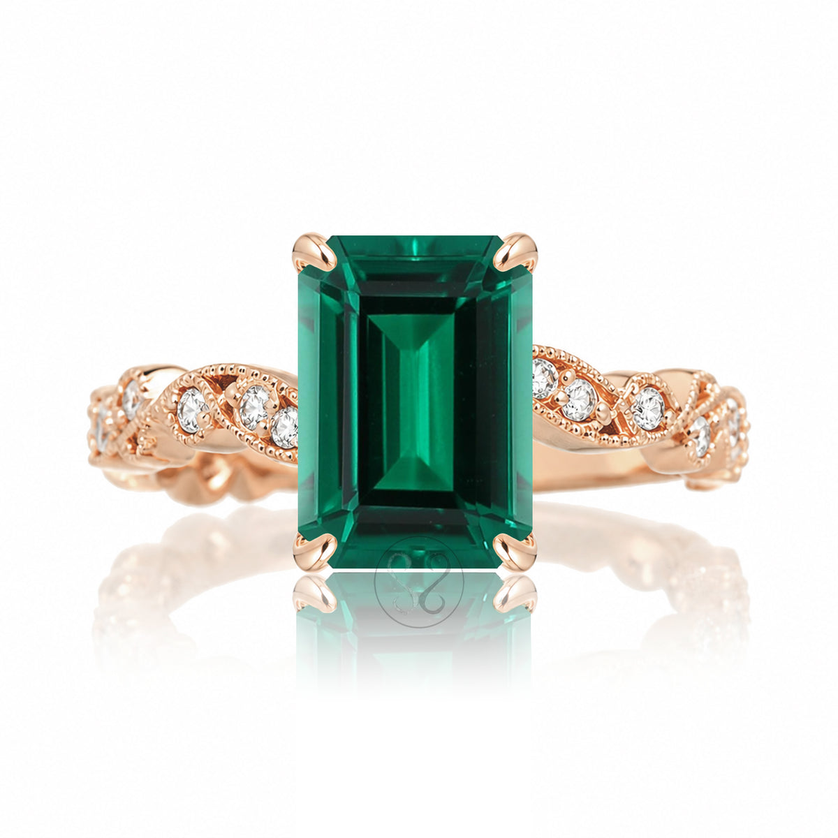 The Elara Step Cut Emerald Ring