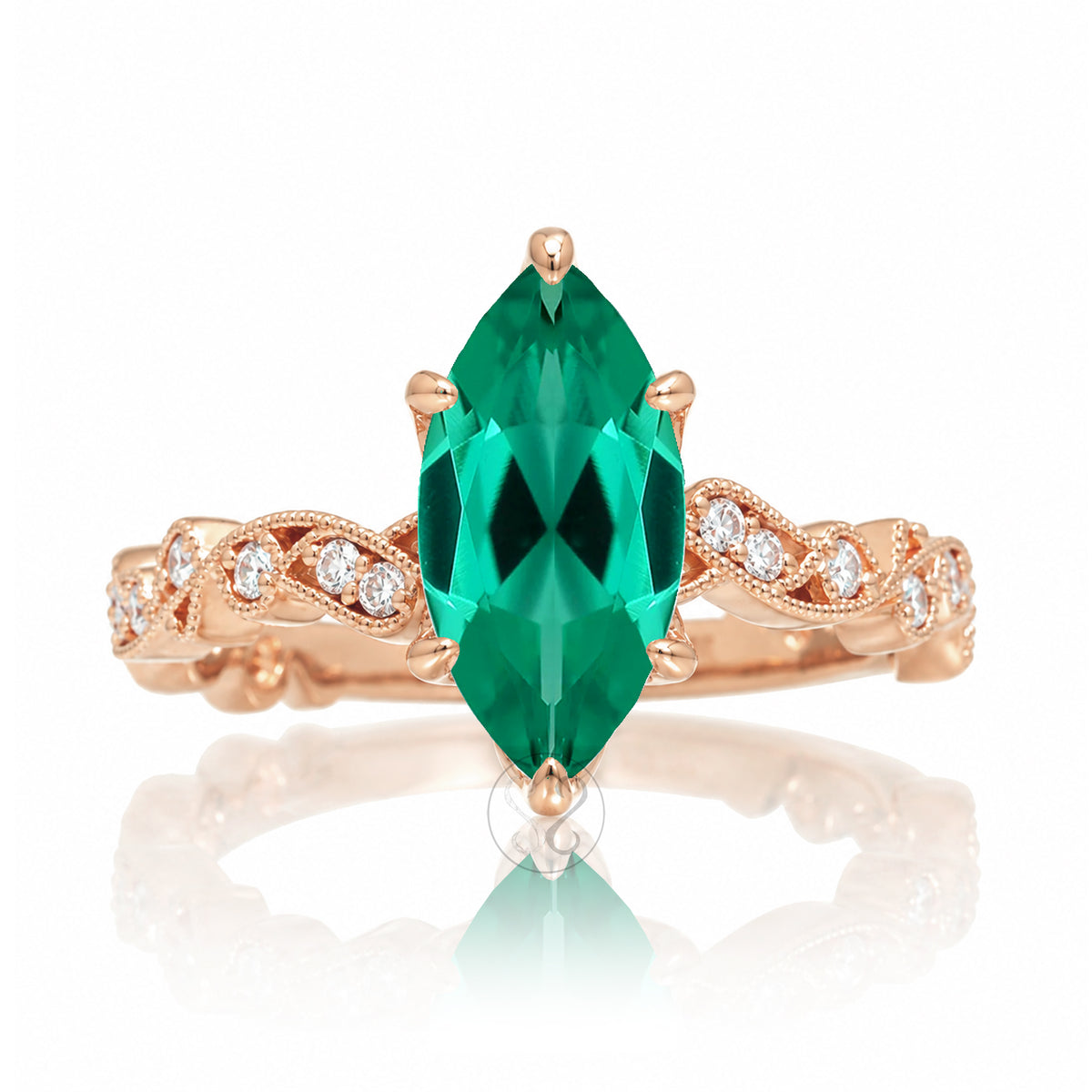 The Elara Marquise Emerald Ring