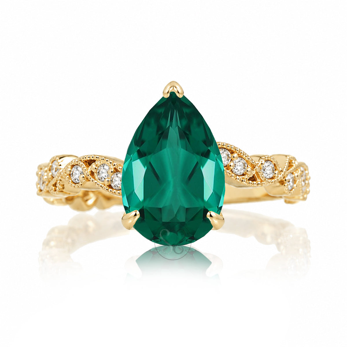 The Elara Pear Emerald Ring