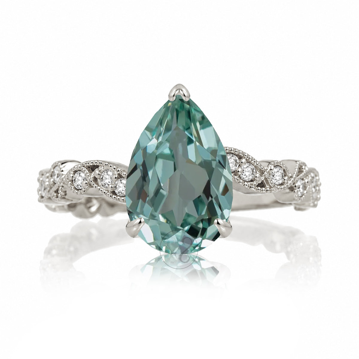 The Elara Pear Green Sapphire Ring