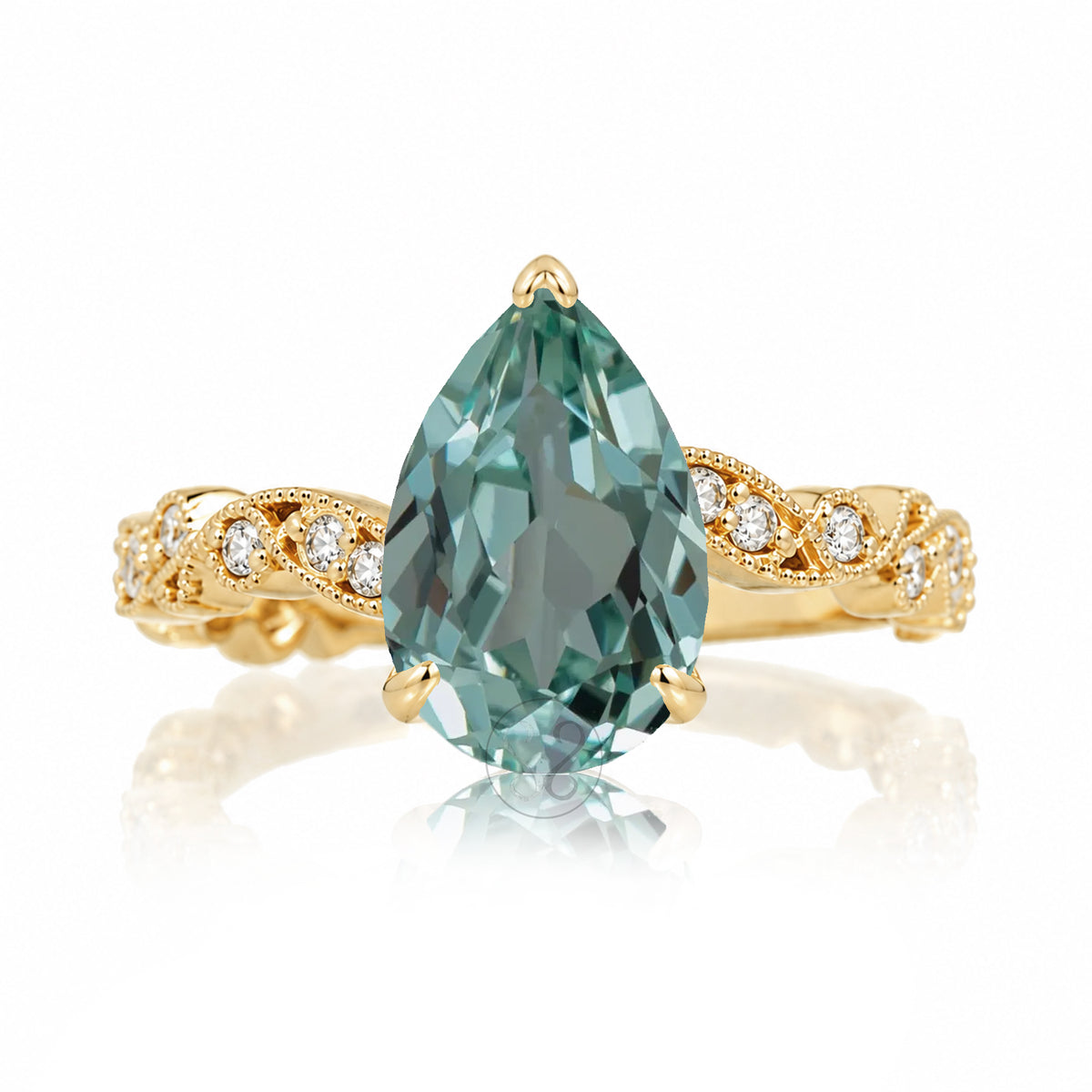 The Elara Pear Green Sapphire Ring