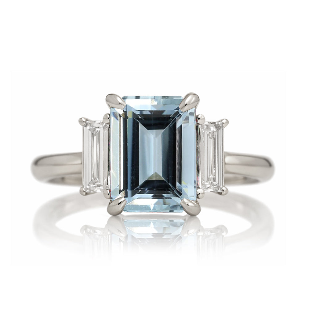 Emerald cut aquamarine ring with long baguette three stone solid comfort fit rounded band white gold