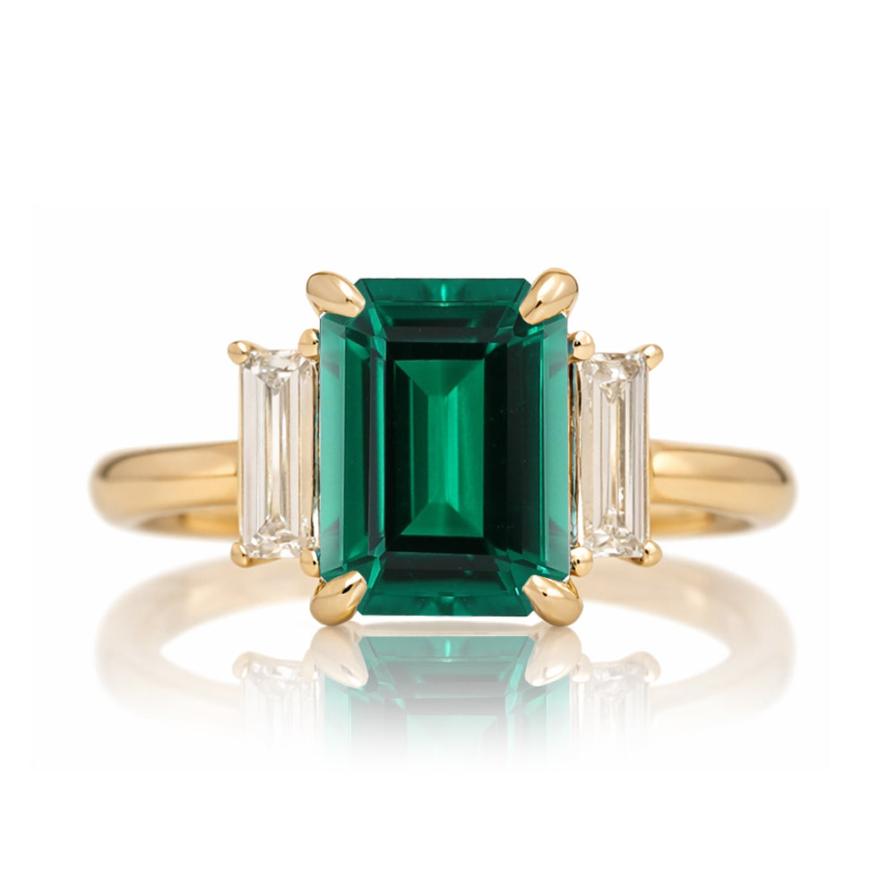 Emerald cut green emerald ring with long baguette three stone solid comfort fit rounded band yellow gold
