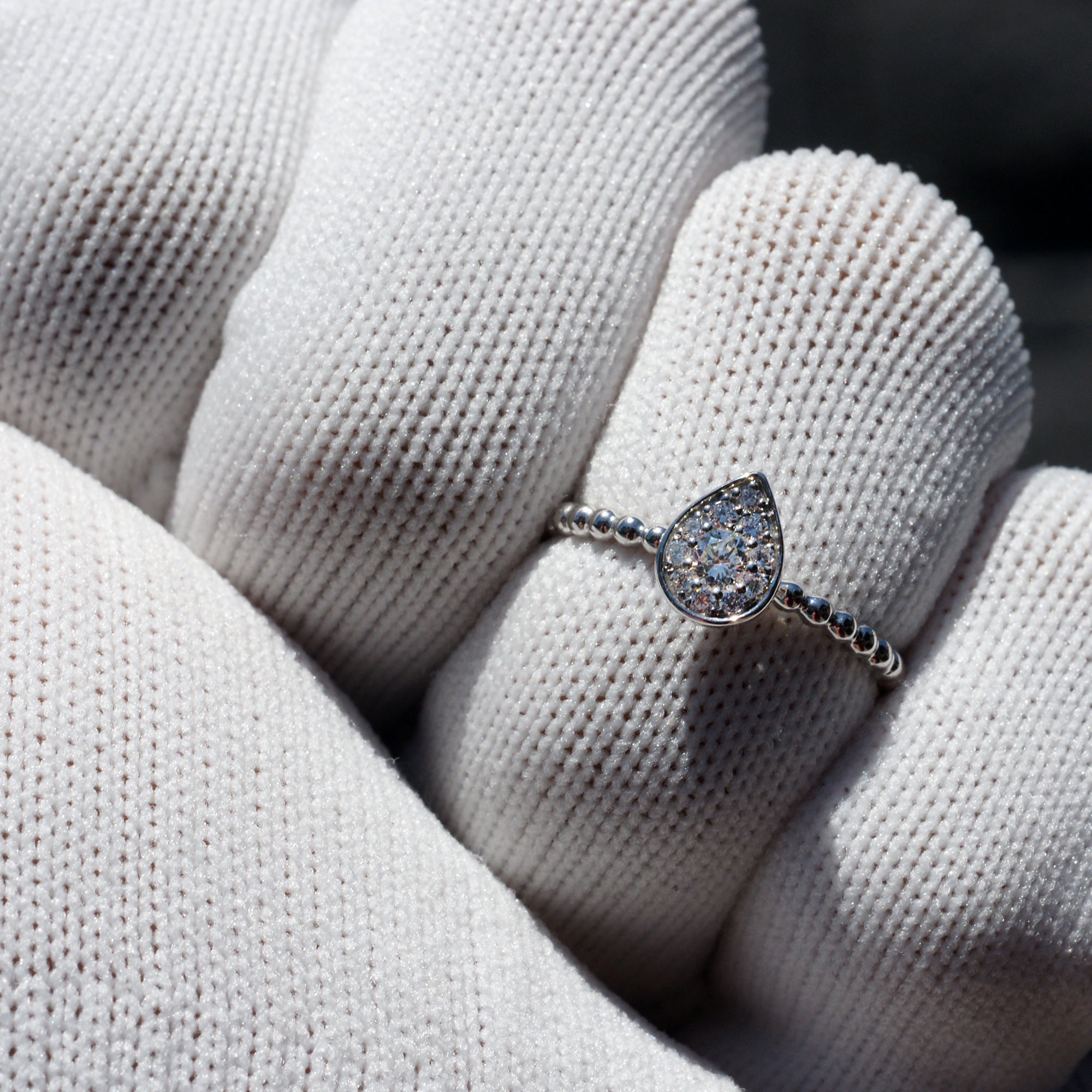 Pear cluster diamond ring with beaded band in white gold