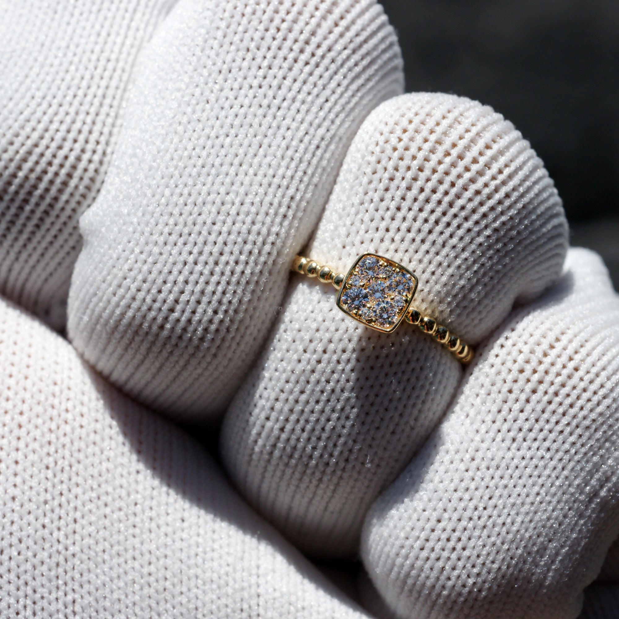 Square cushion cluster diamond solitaire with beaded yellow gold band