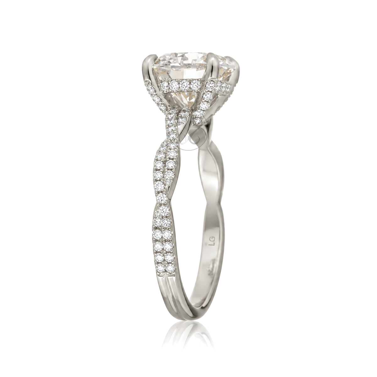 Side view of The Seraphina round diamond engagement ring in white gold with twisted pavé diamond band and four-prong setting