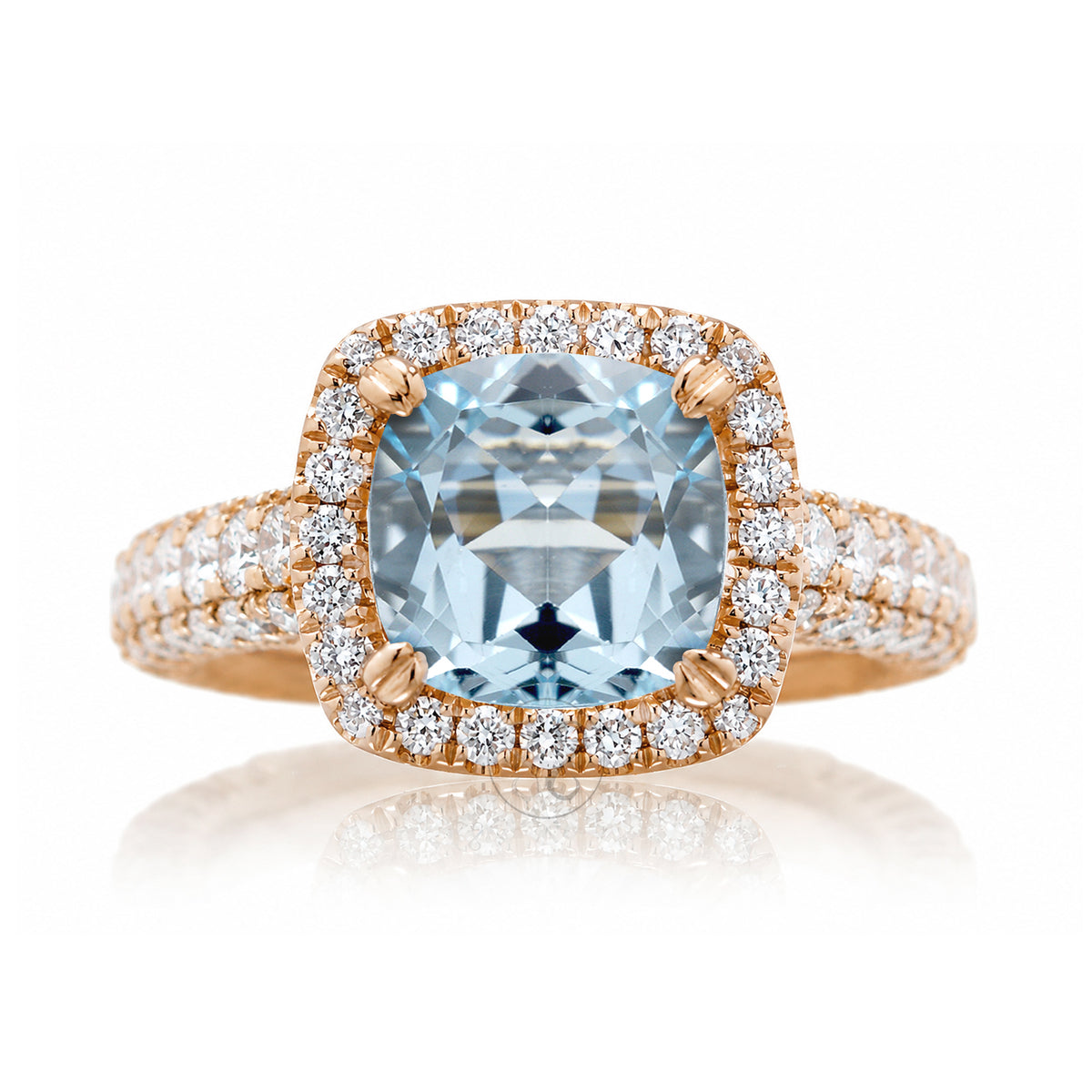 Cushion-cut aquamarine engagement ring in rose gold with diamond halo and pavé diamond shoulders The Tamara