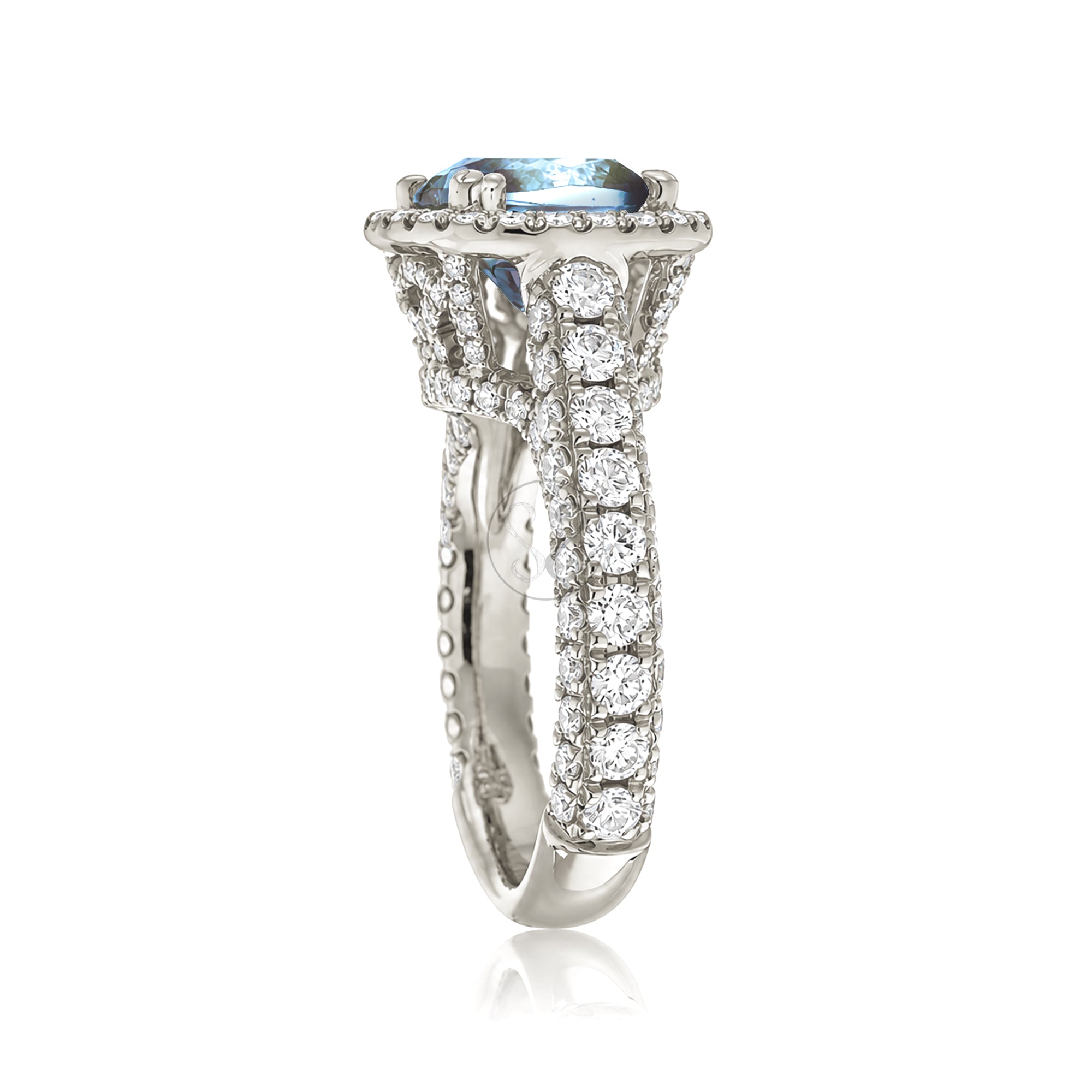 Cushion-cut aquamarine engagement ring in white gold with diamond halo and pavé diamond shoulders The Tamara