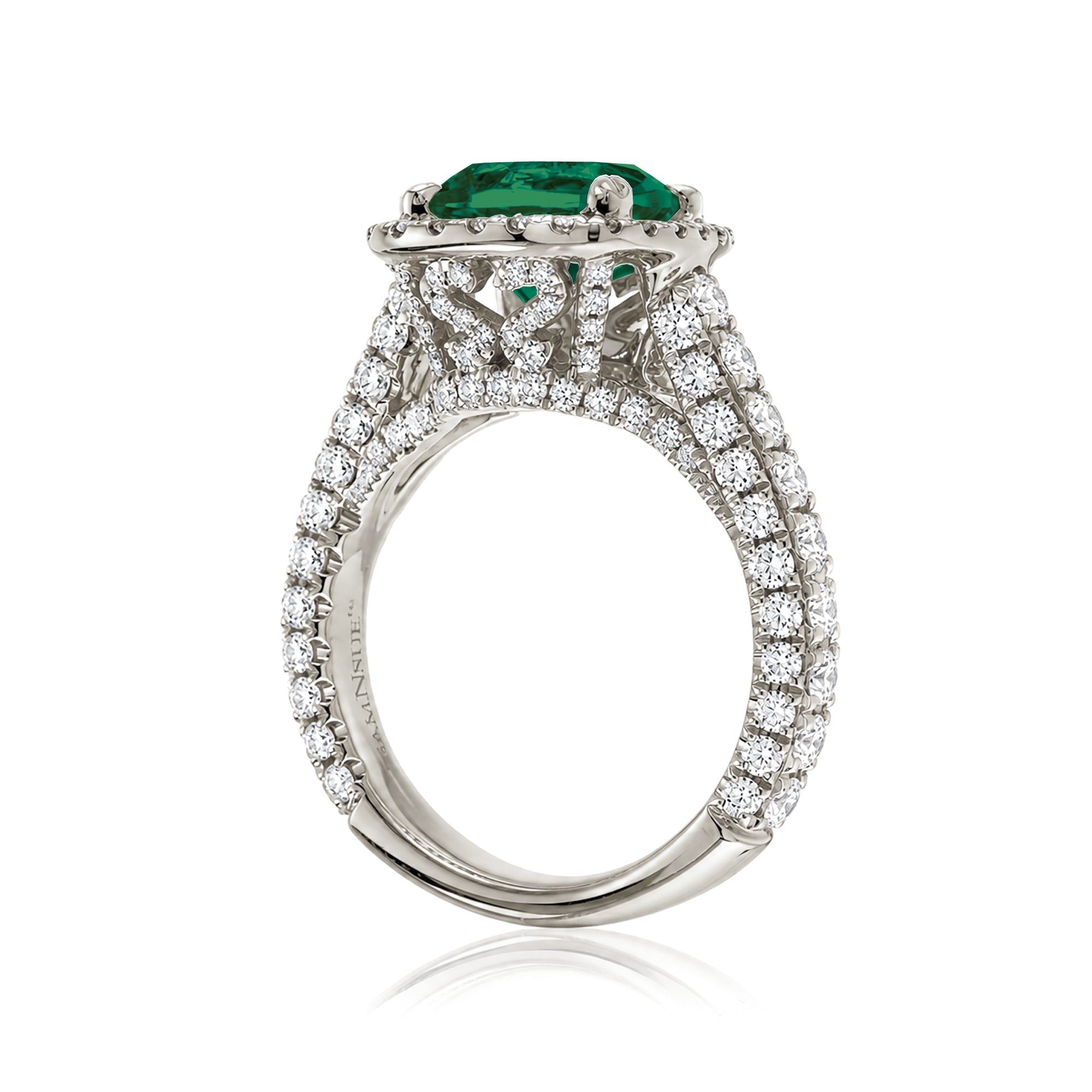Cushion-cut emerald engagement ring in white gold with diamond halo and pavé diamond shoulders The Tamara