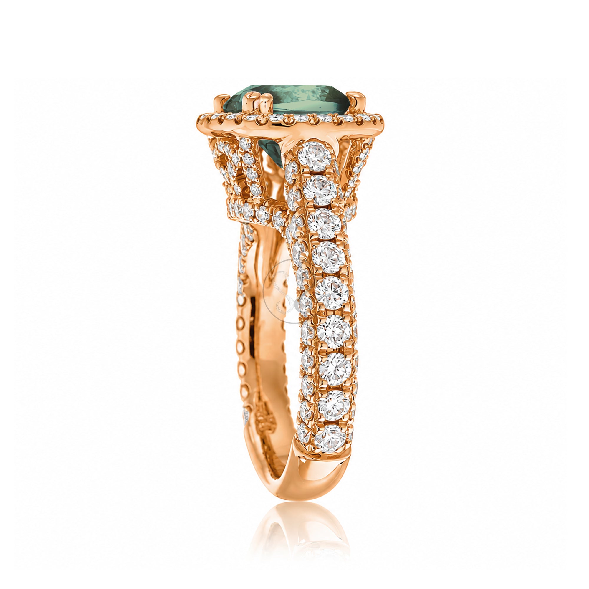 Cushion-cut green sapphire engagement ring in rose gold with diamond halo and pavé diamond shoulders