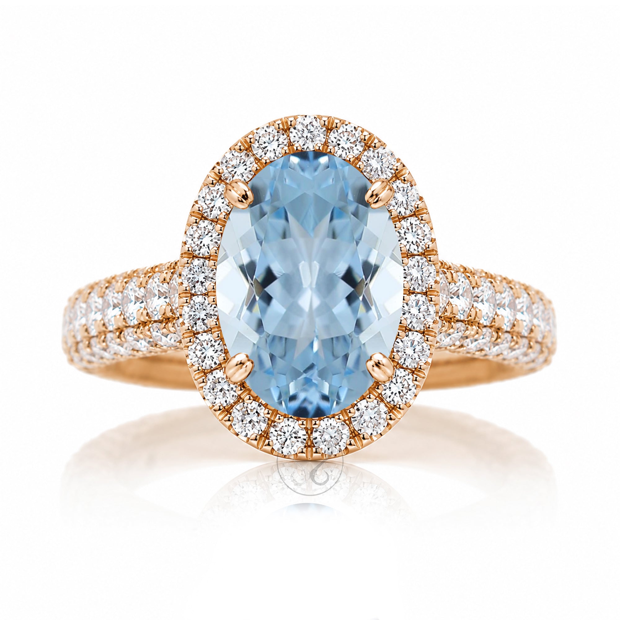 Oval-cut aquamarine engagement ring in rose gold with diamond halo and pavé diamond shoulders The Tamara