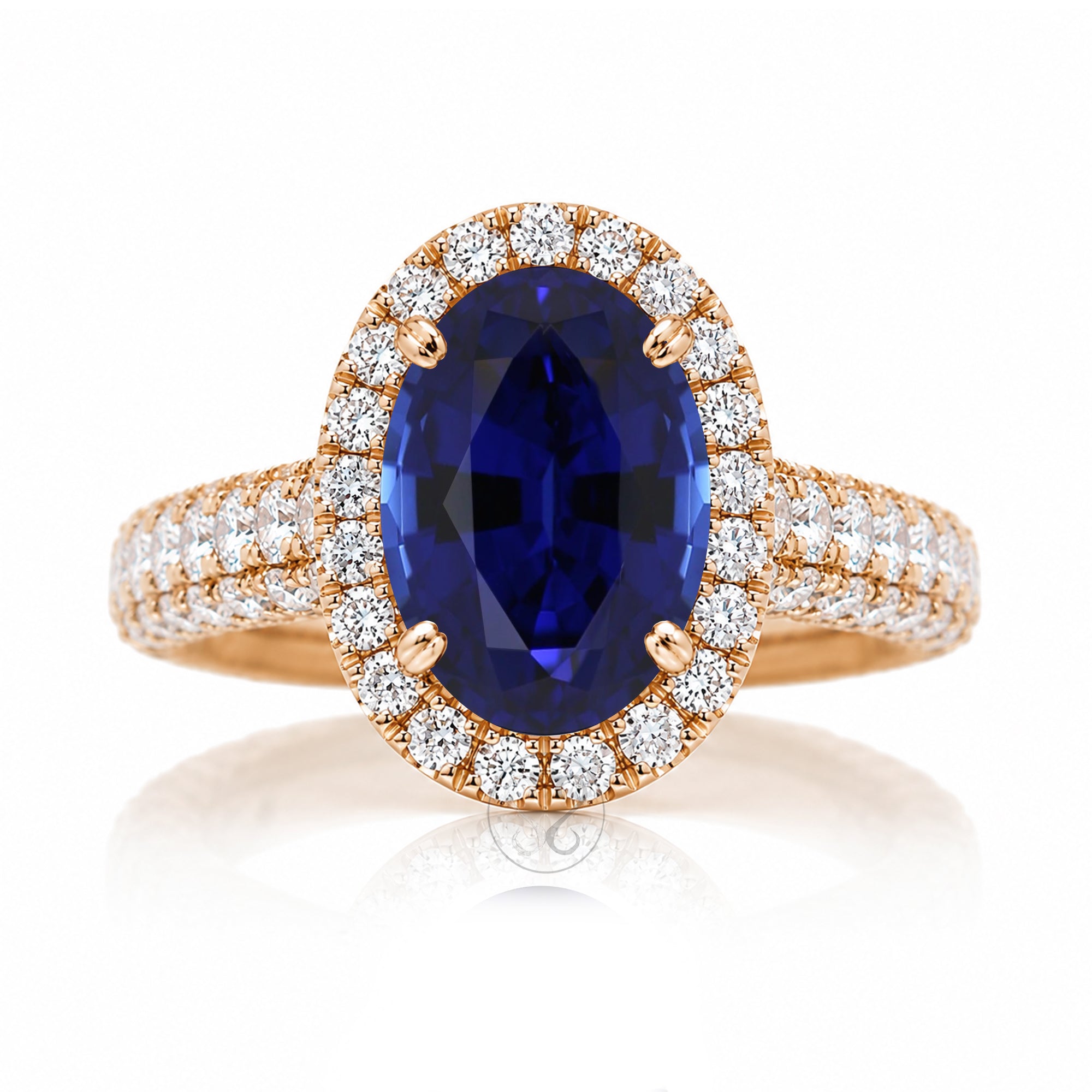 Oval blue sapphire diamond halo with three dimensional dome band in rose gold