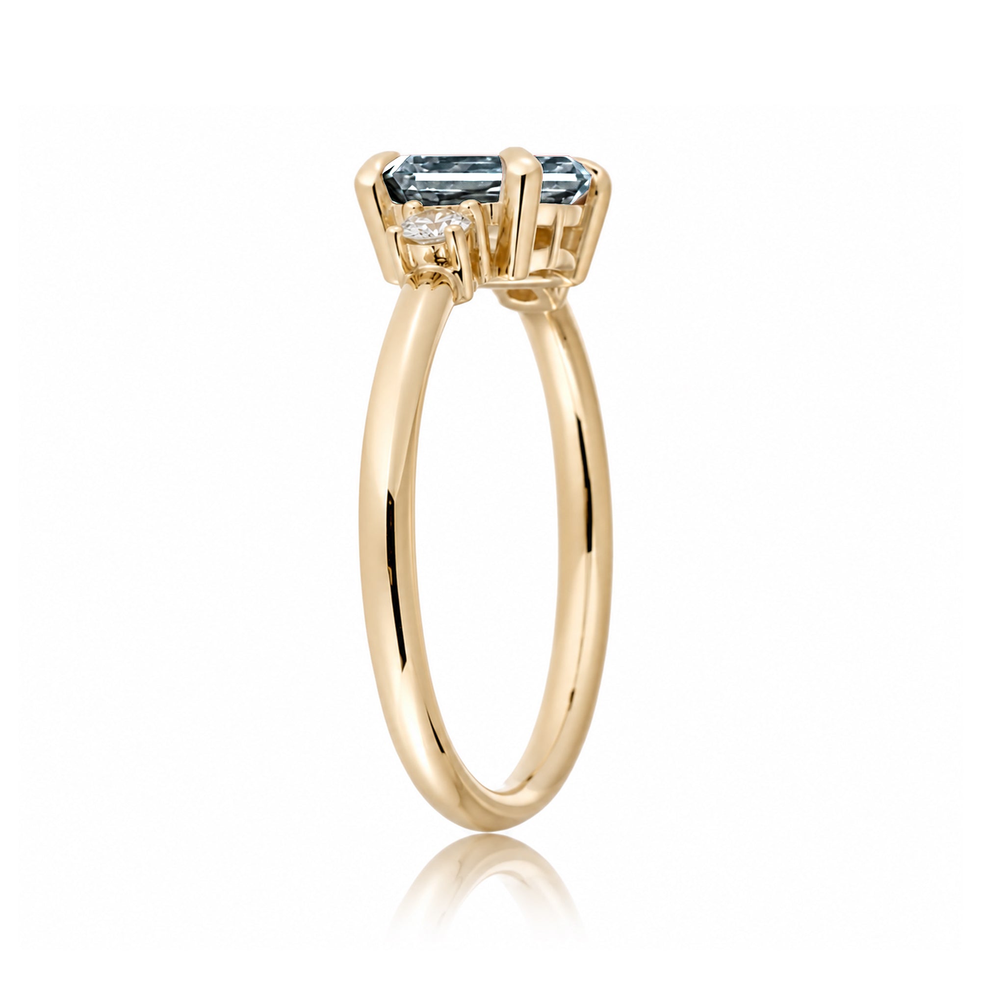 Aquamarine three stone east-west ring the Lena yellow gold