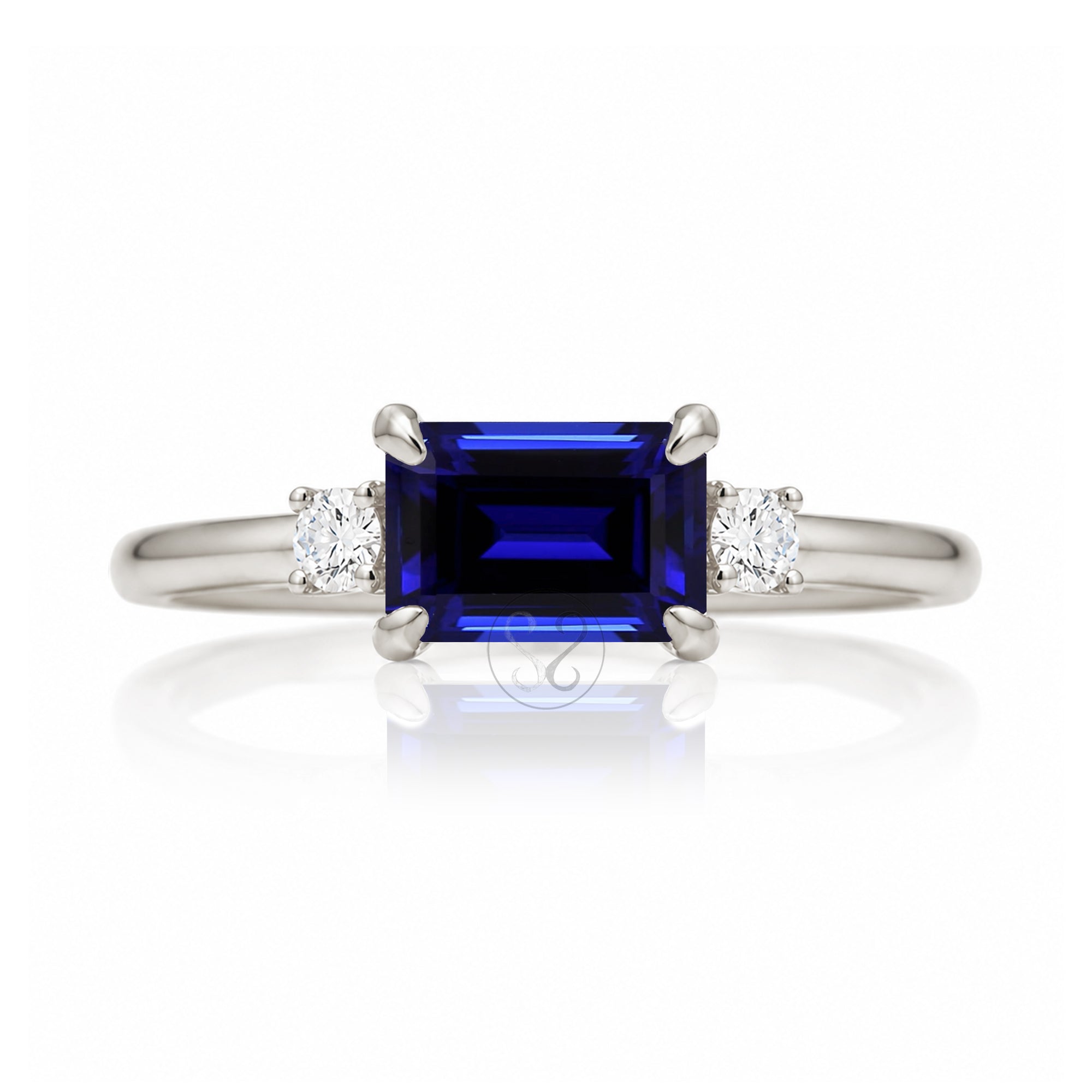 Blue sapphire emerald cut three stone ring the Lena white gold