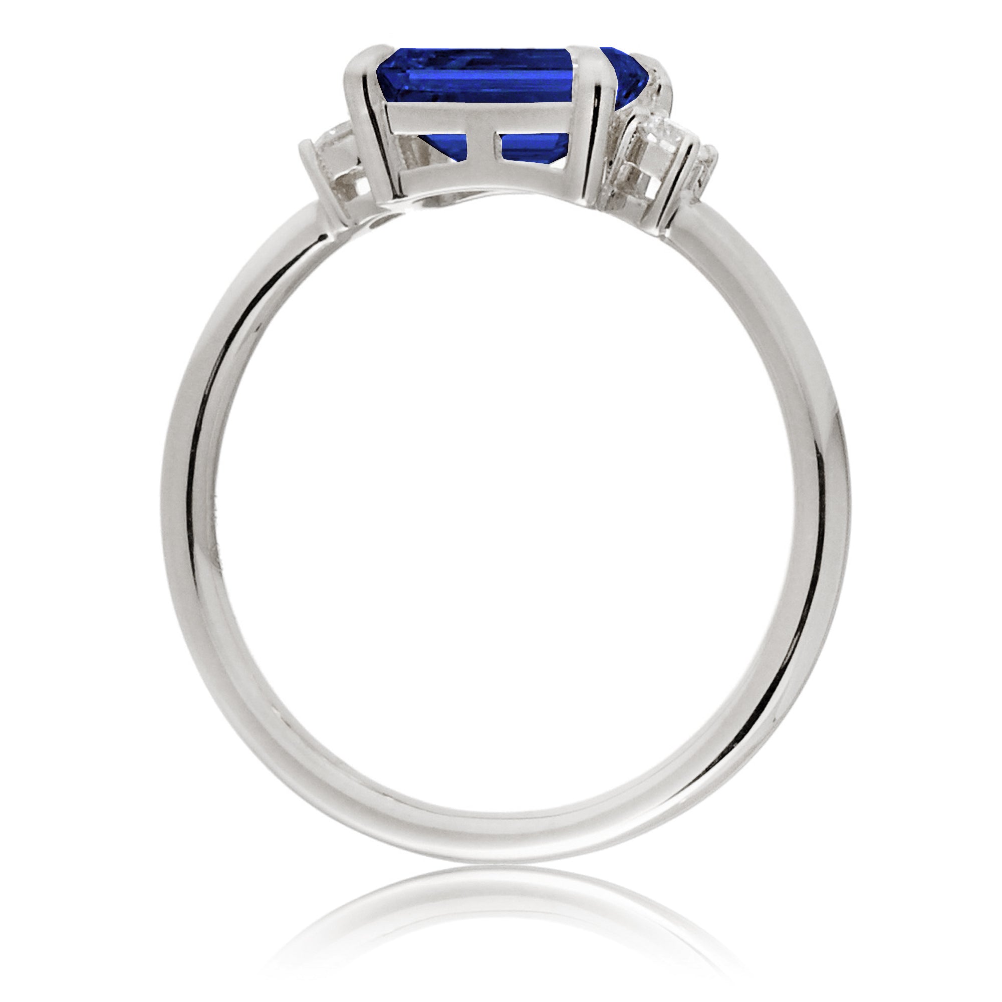 Blue sapphire emerald cut three stone ring the Lena white gold