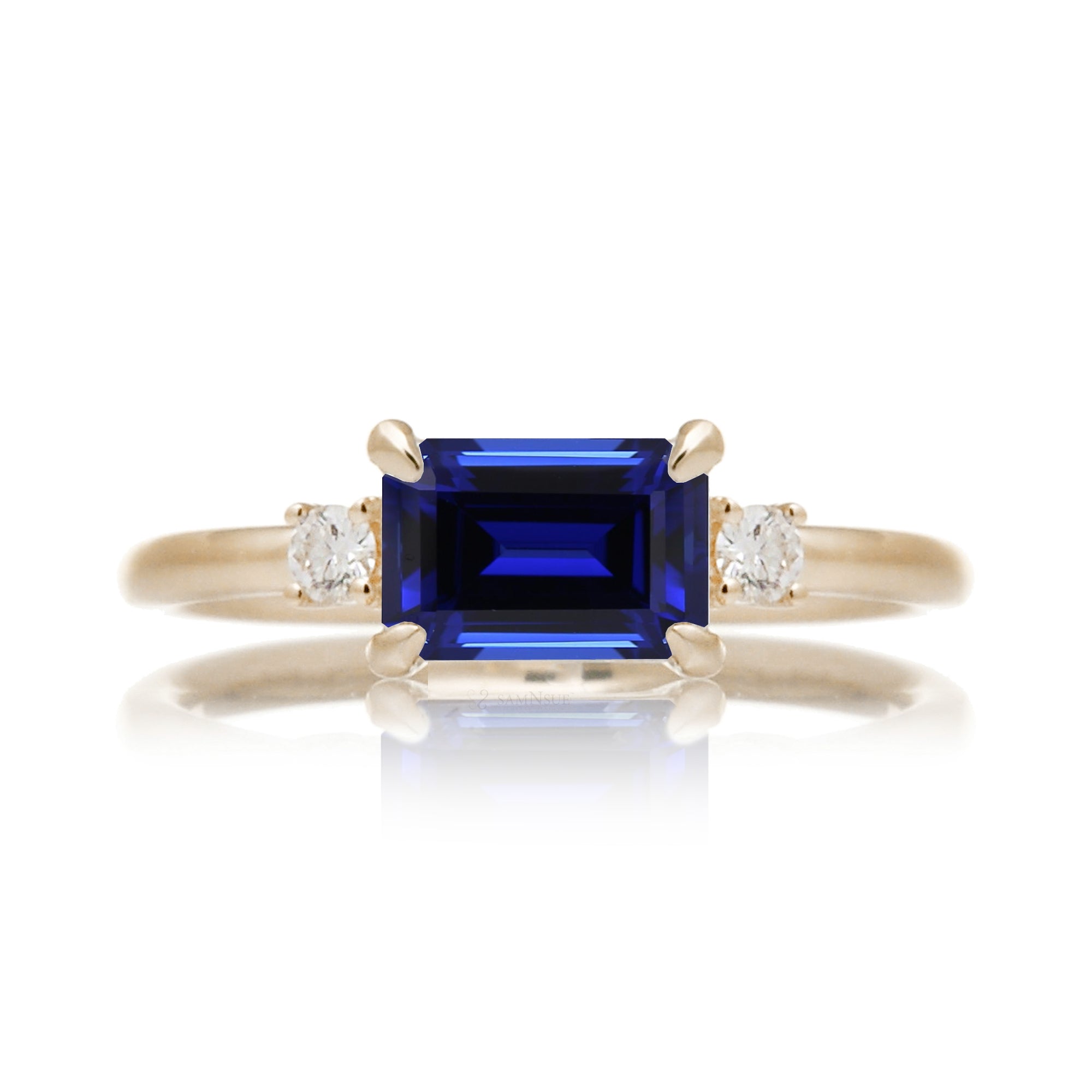 Blue sapphire emerald cut three stone ring the Lena yellow gold