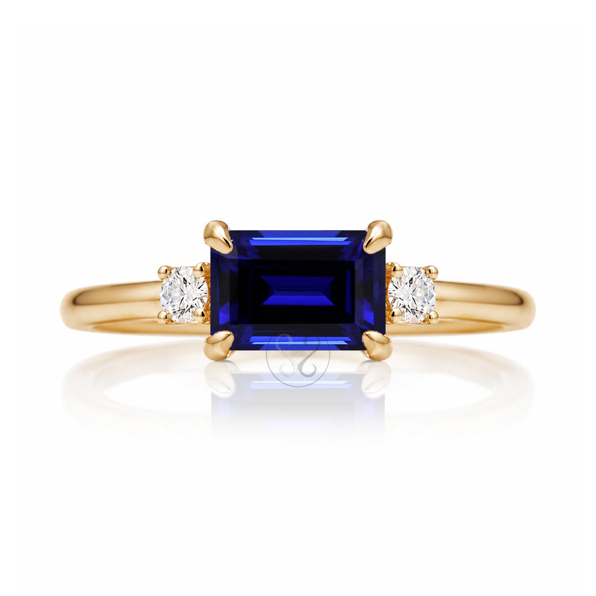 Blue sapphire emerald cut three stone ring the Lena yellow gold