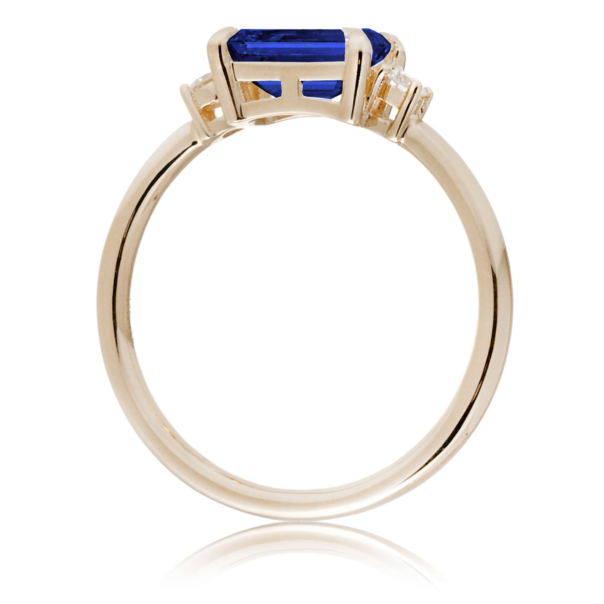 Blue sapphire emerald cut three stone ring the Lena yellow gold