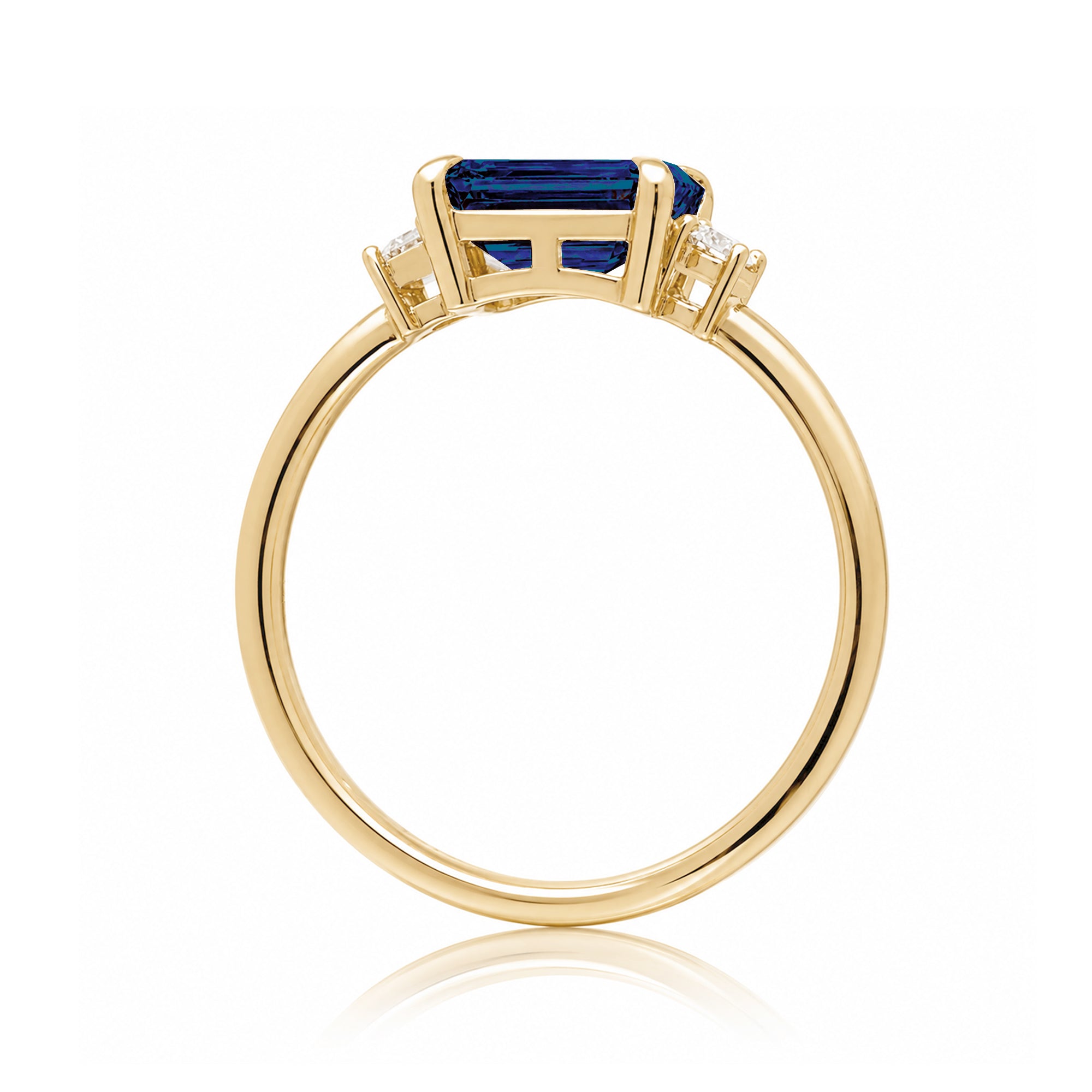 Blue sapphire emerald cut three stone ring the Lena yellow gold