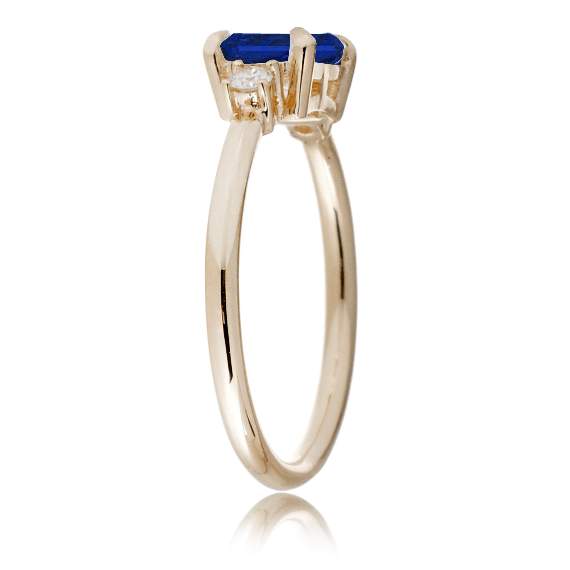 Blue sapphire emerald cut three stone ring the Lena yellow gold