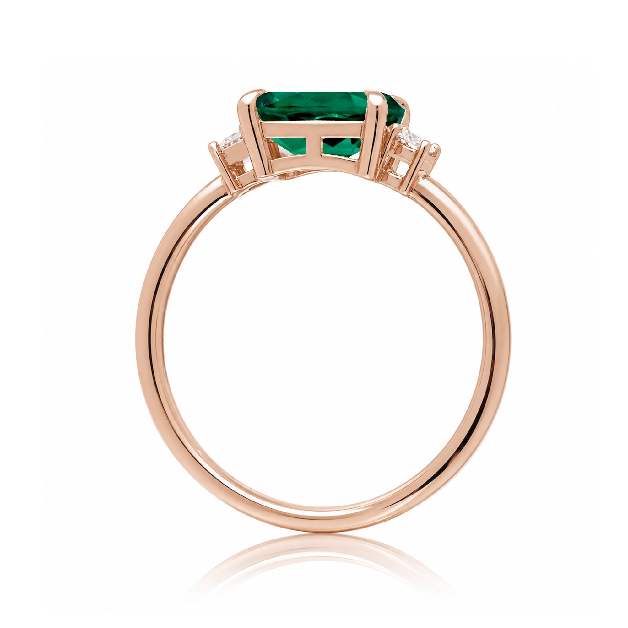Three Stone side way setting emerald step cut rose gold ring
