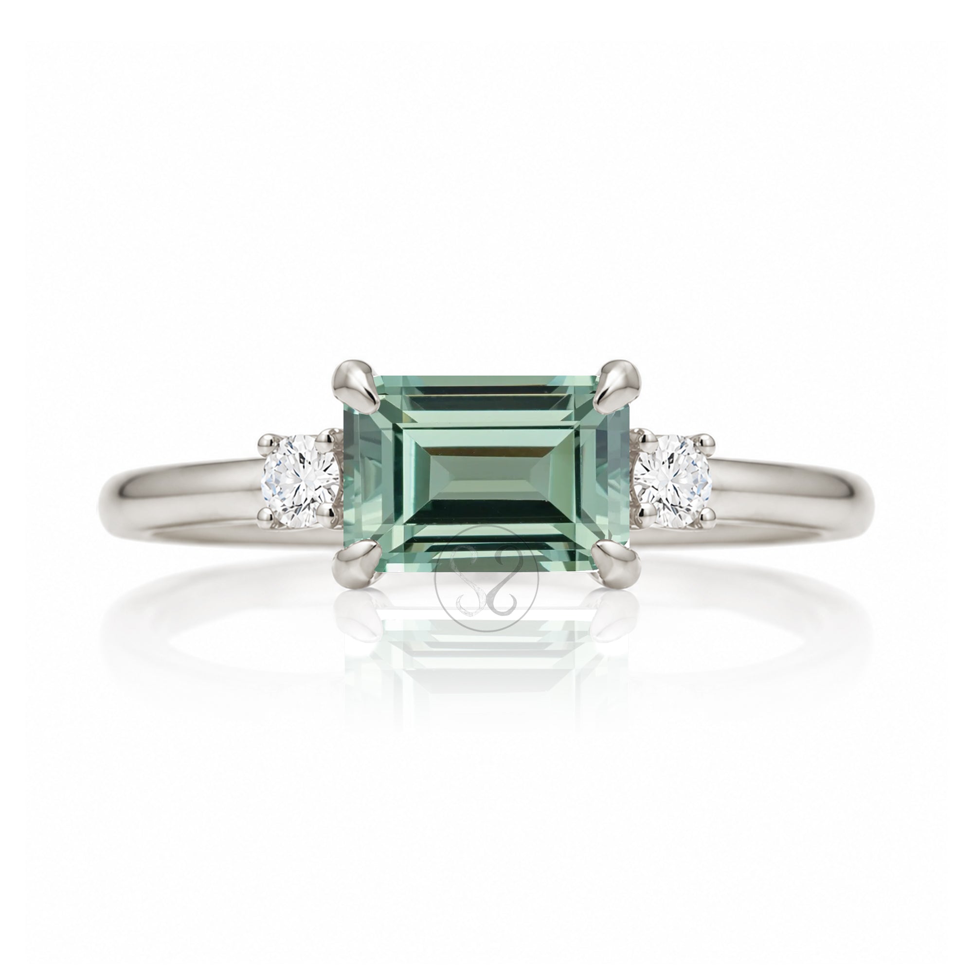 Emerald cut green sapphire three stone ring the Lena white gold