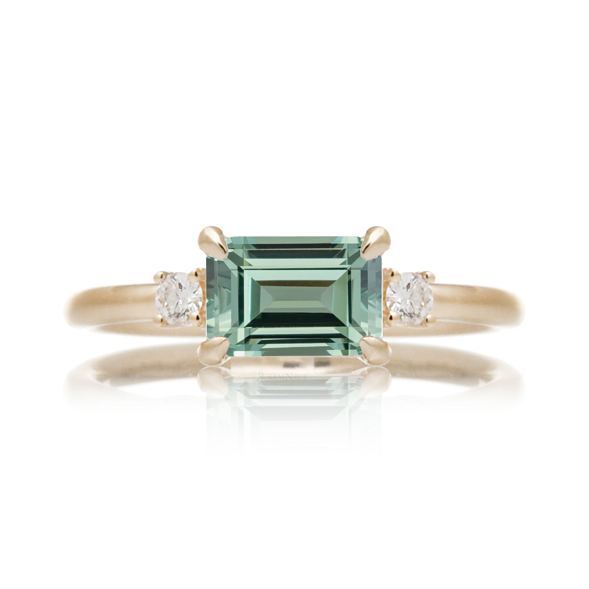Emerald cut green sapphire three stone ring the Lena yellow gold