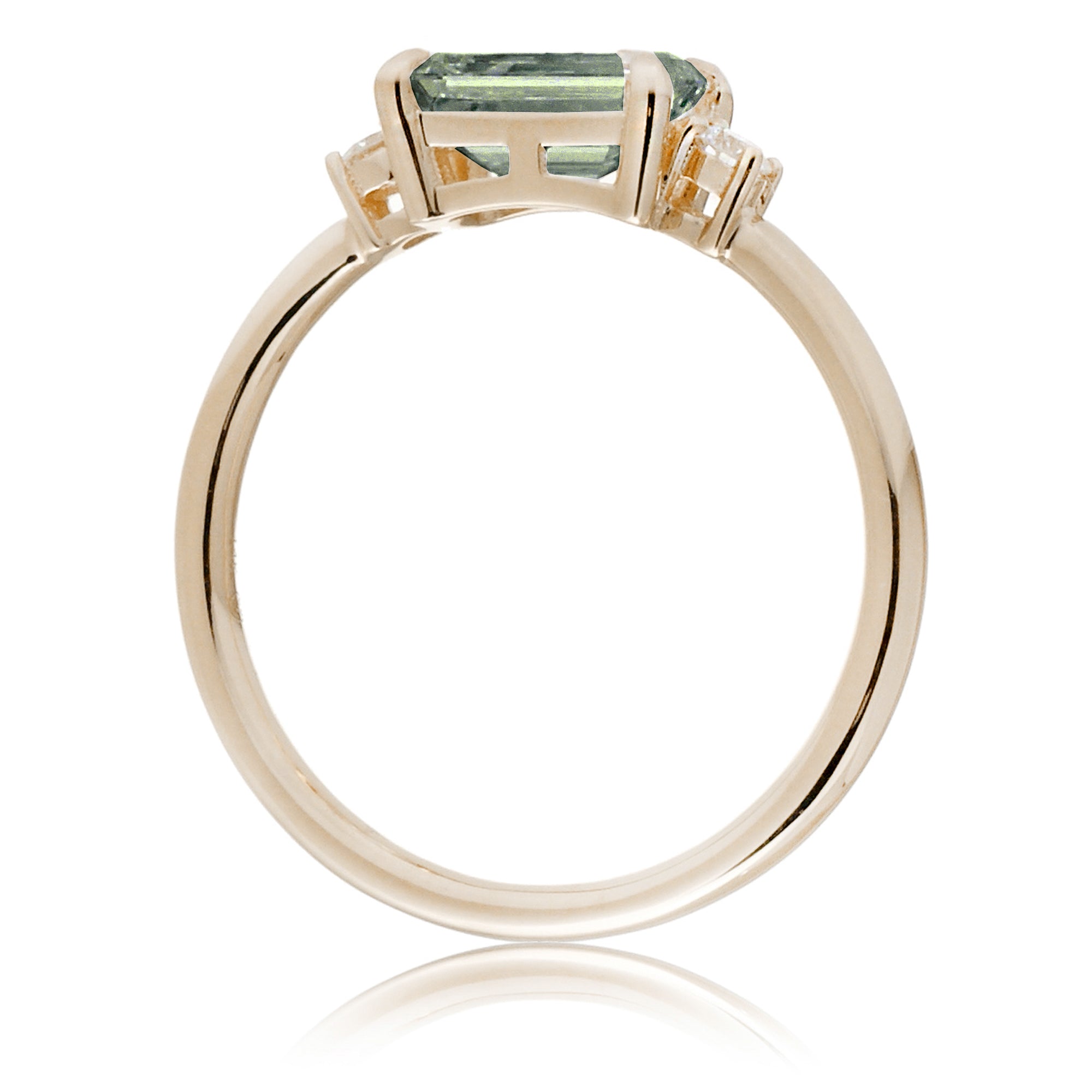 Emerald cut green sapphire three stone ring the Lena yellow gold