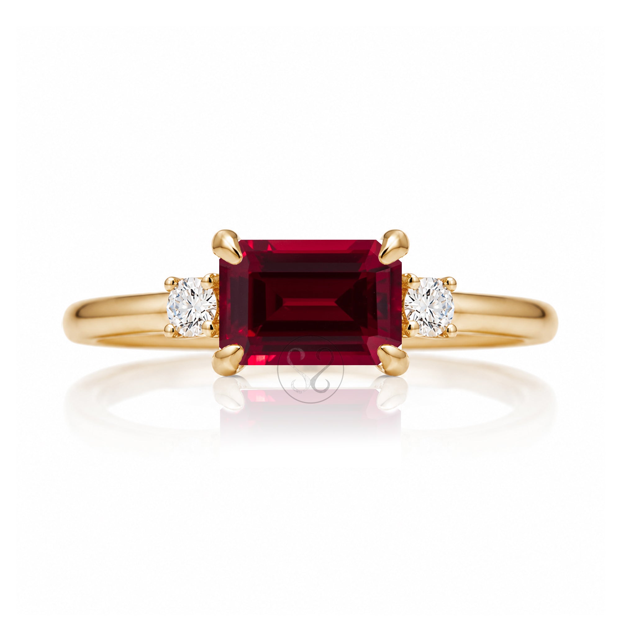 Ruby three stone ring east west the Lena yellow gold