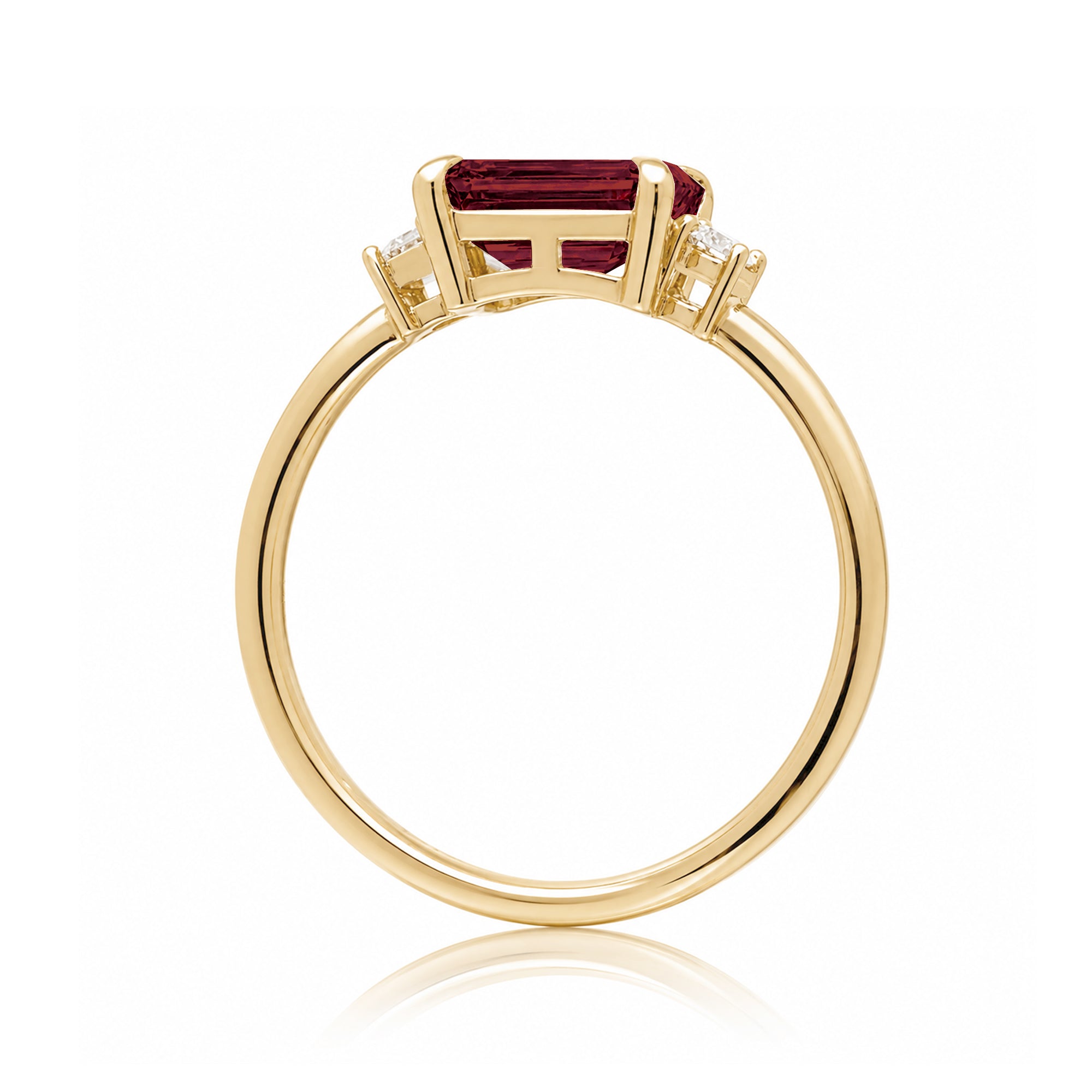 Ruby three stone ring east west the Lena yellow gold