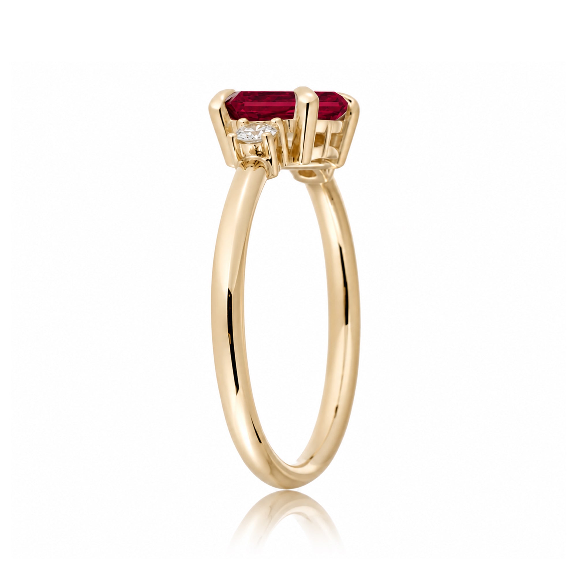 Ruby three stone ring east west the Lena yellow gold
