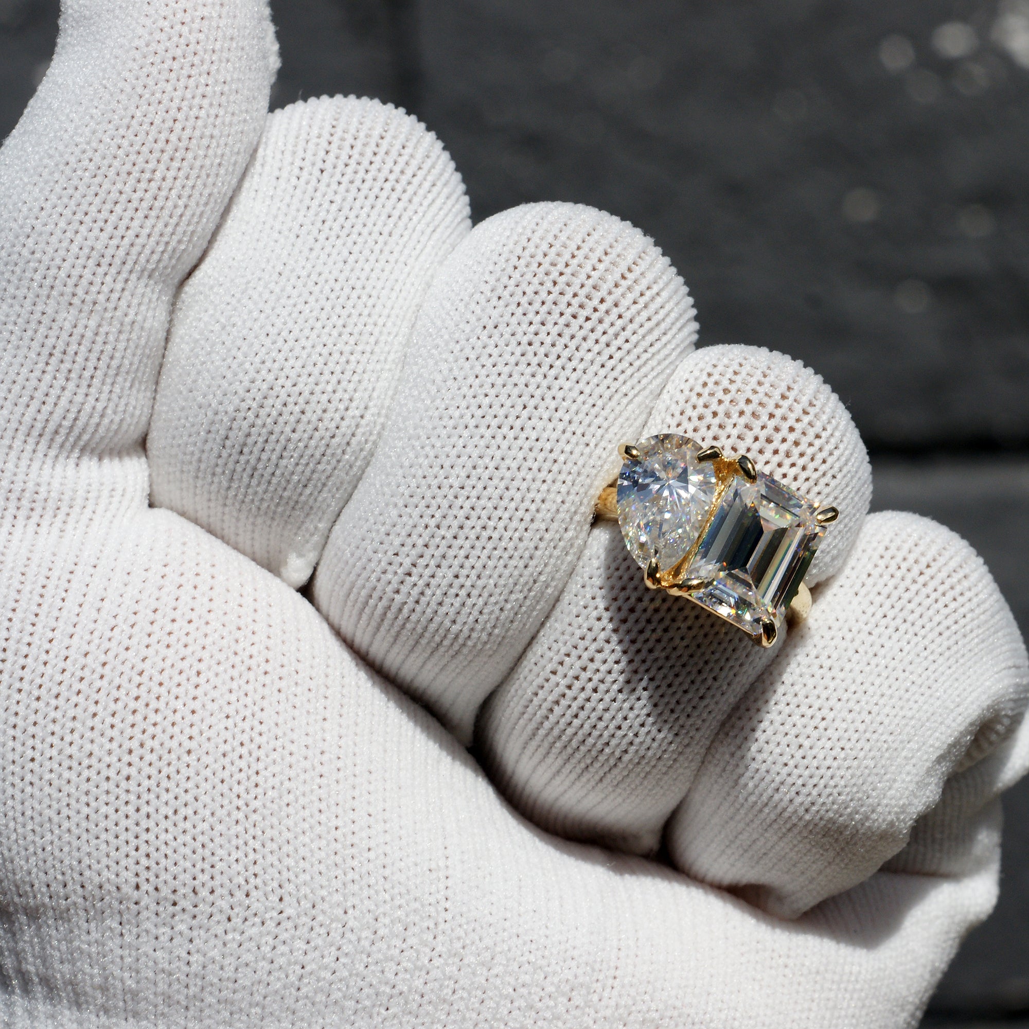 Toi et moi emerald cut and pear cut moissanite ring yellow gold 7ct