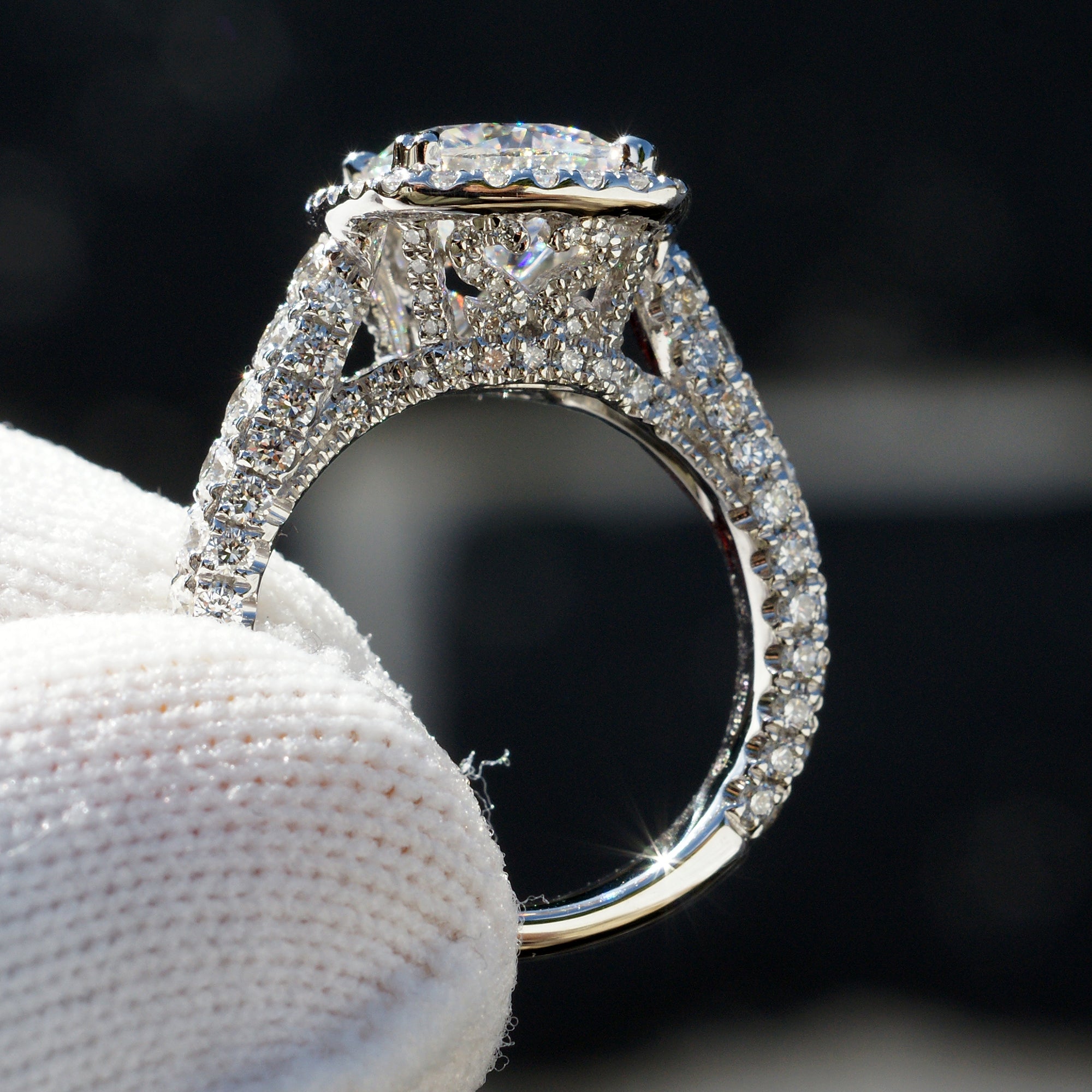 Cushion cut moissanite and diamond halo total drenched engagement ring in white gold