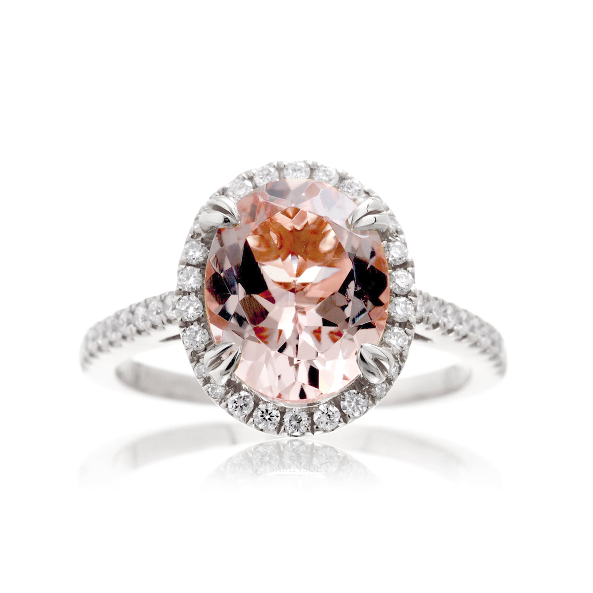 Oval morganite engagement ring with diamond halo in white gold