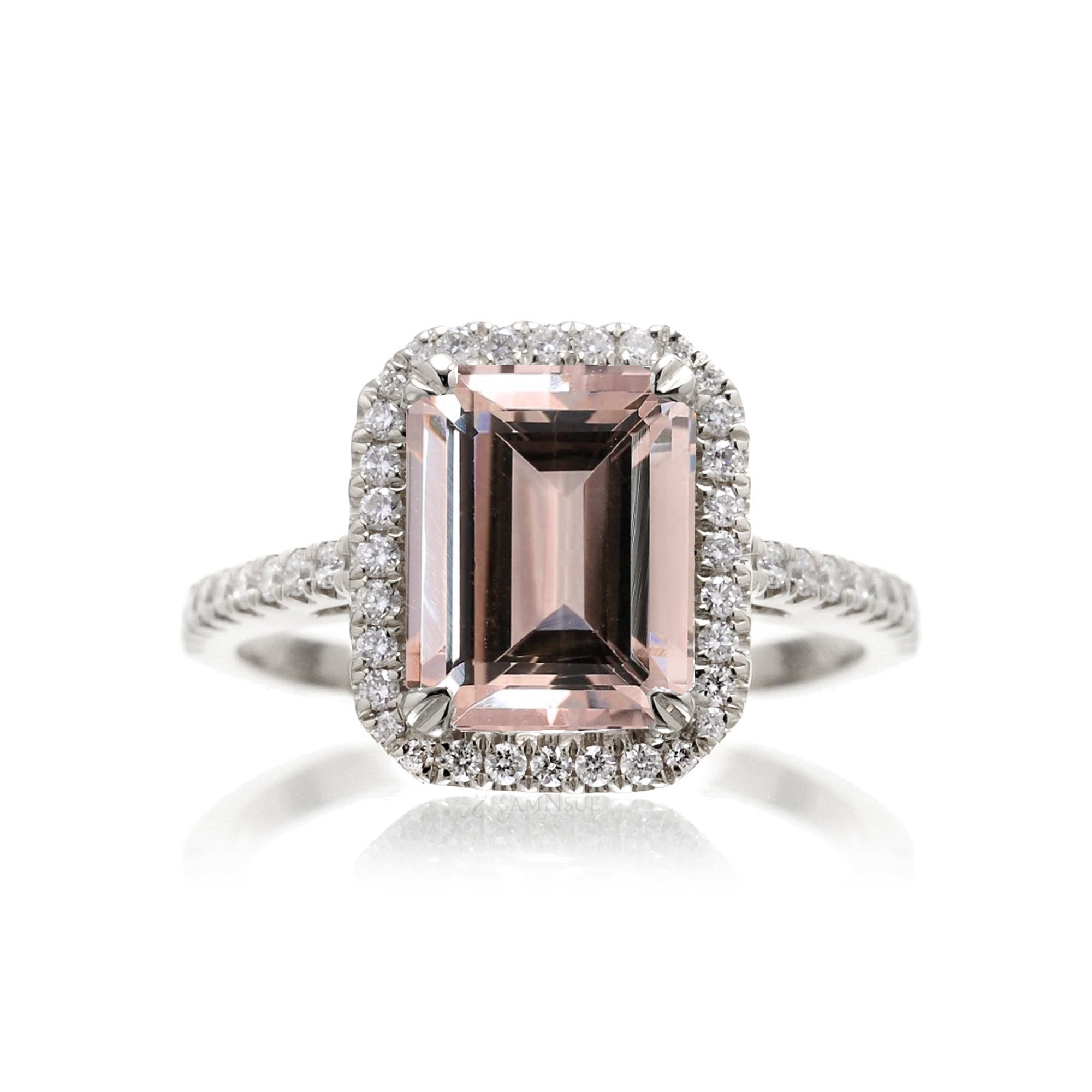 Emerald cut morganite ring with diamond halo in white gold