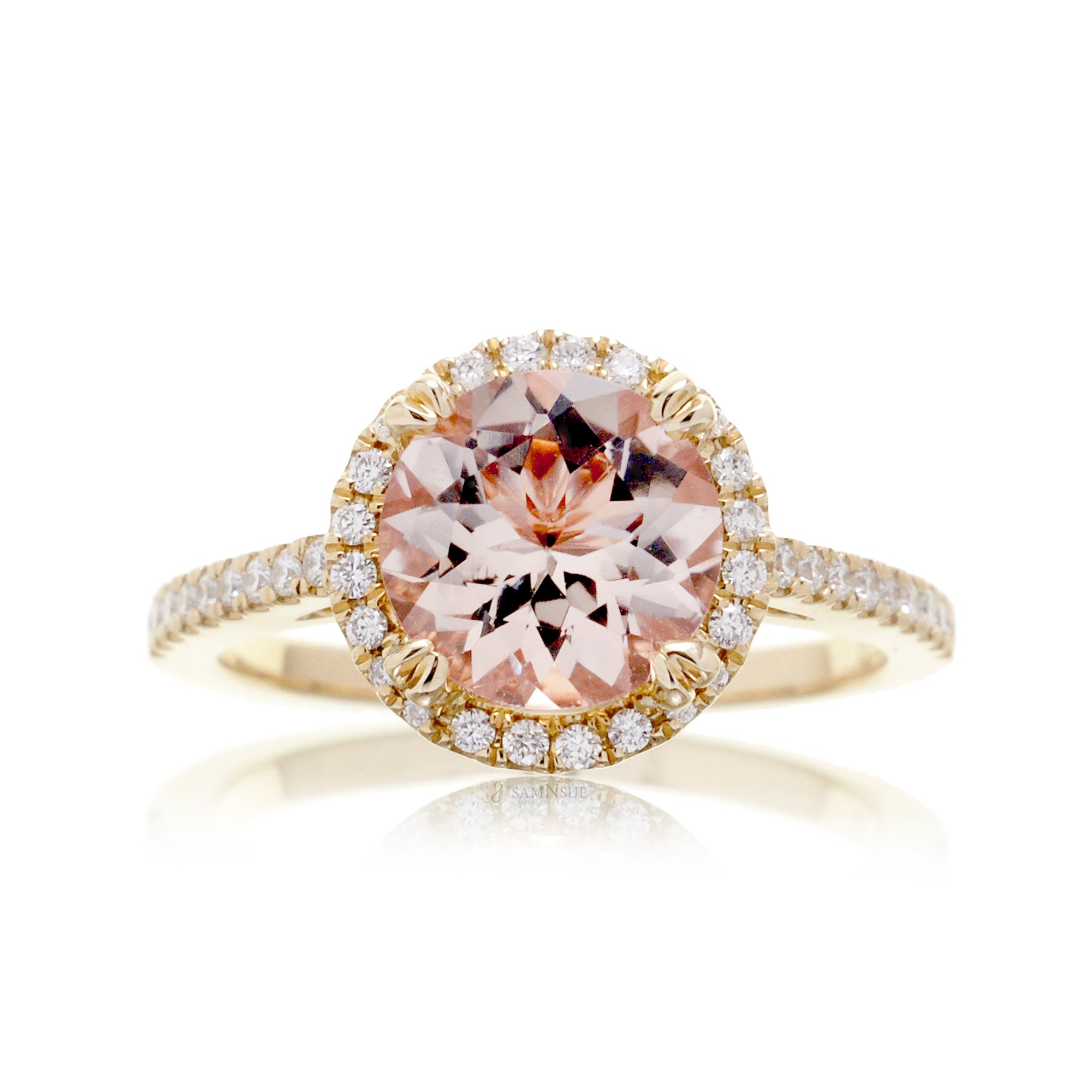 Round morganite diamond halo engagement ring in yellow gold