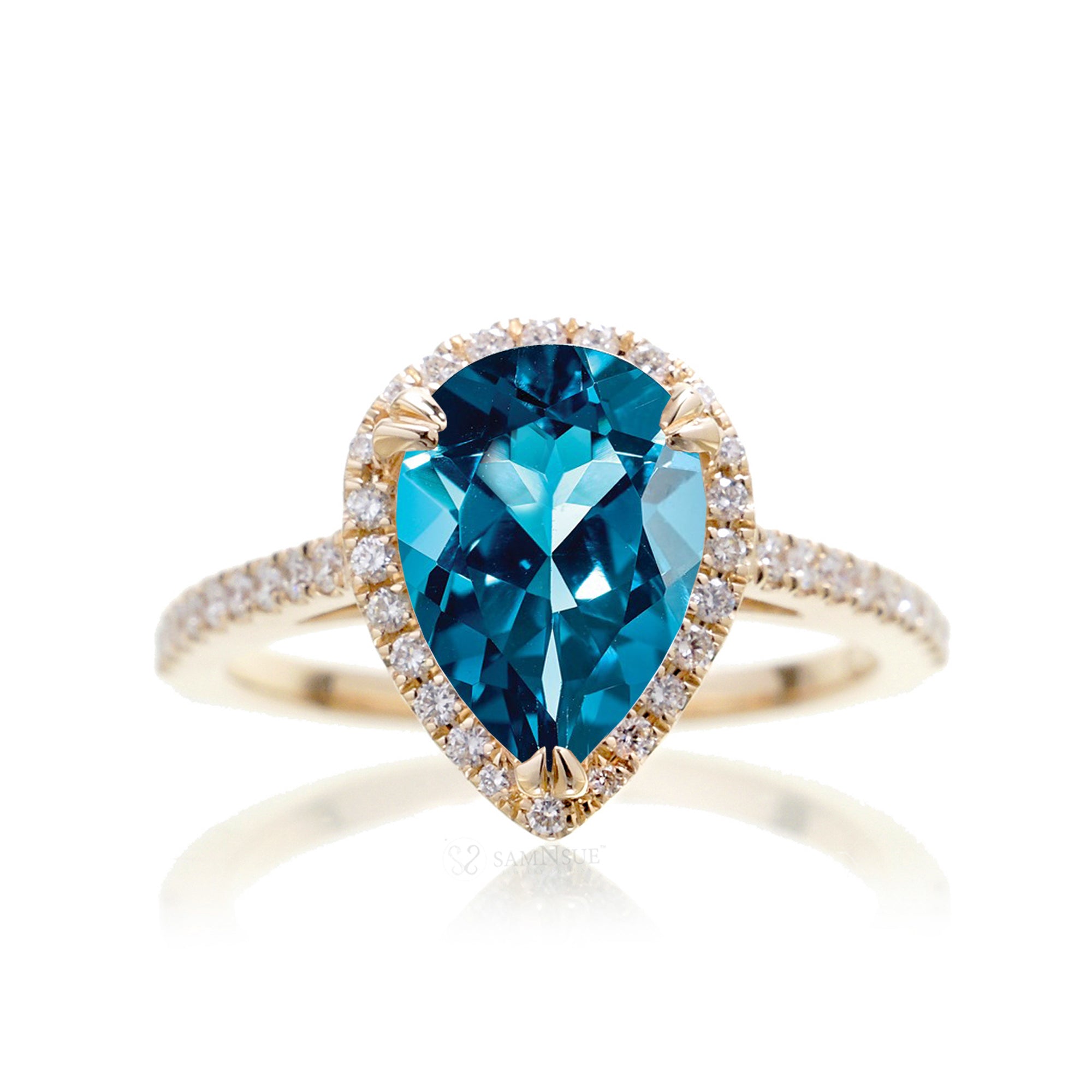 London blue topaz pear shape diamond halo engagement ring