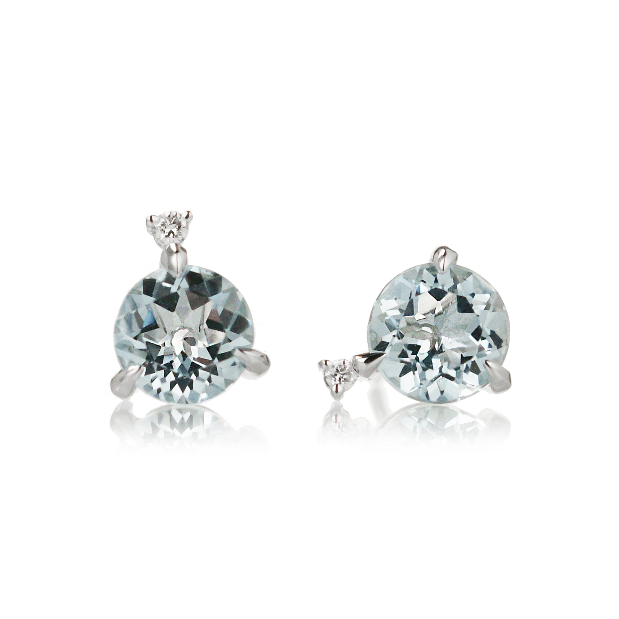 Round aquamarine stud earrings with diamond accent