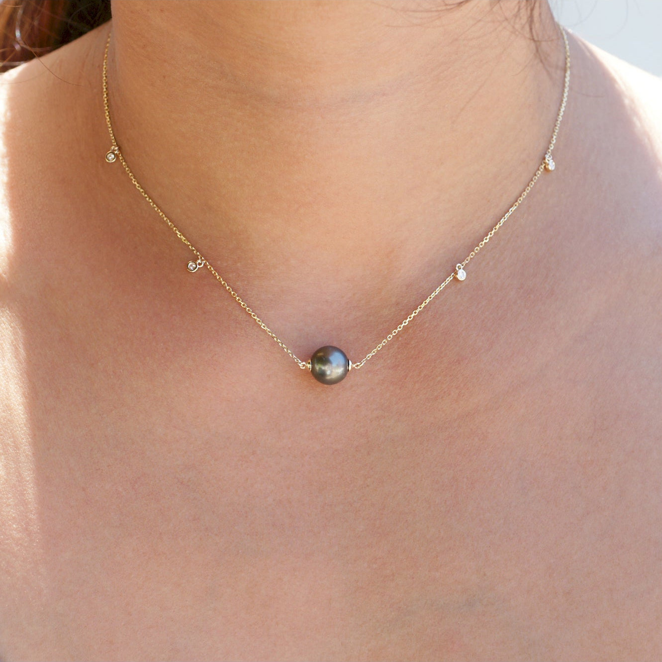 Black Tahitian pearl solitaire pendant necklace with diamonds by the yard