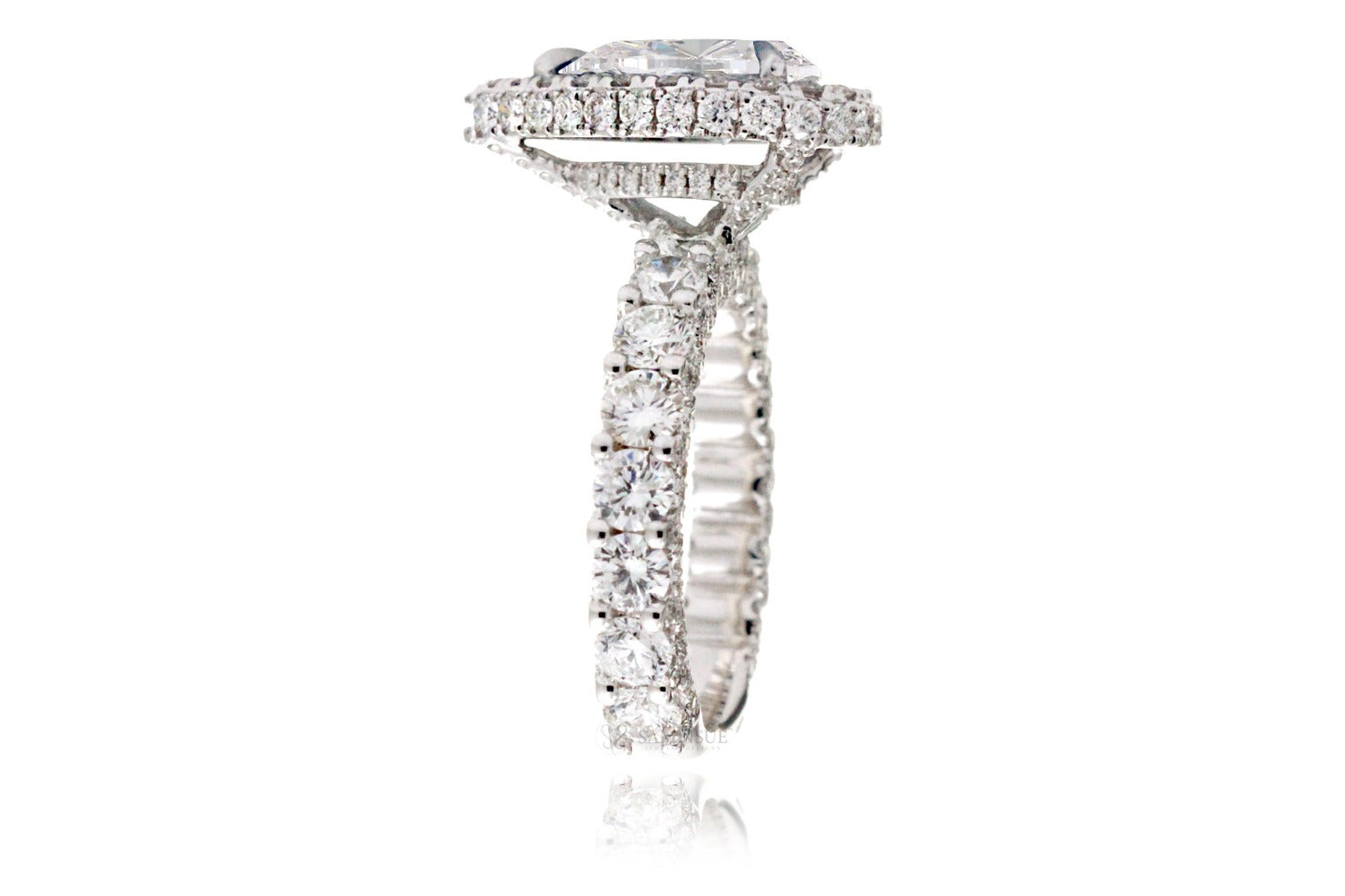 Pear diamond ring with two sided halo and u prong band in platinum