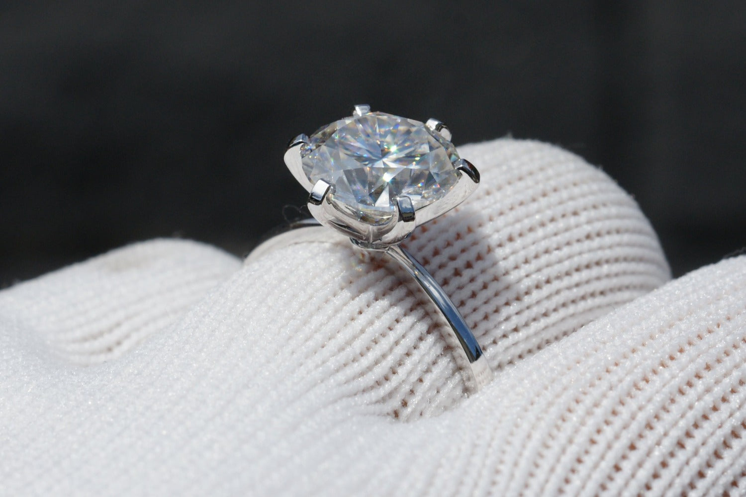 Six prong solitaire engagement ring in white gold