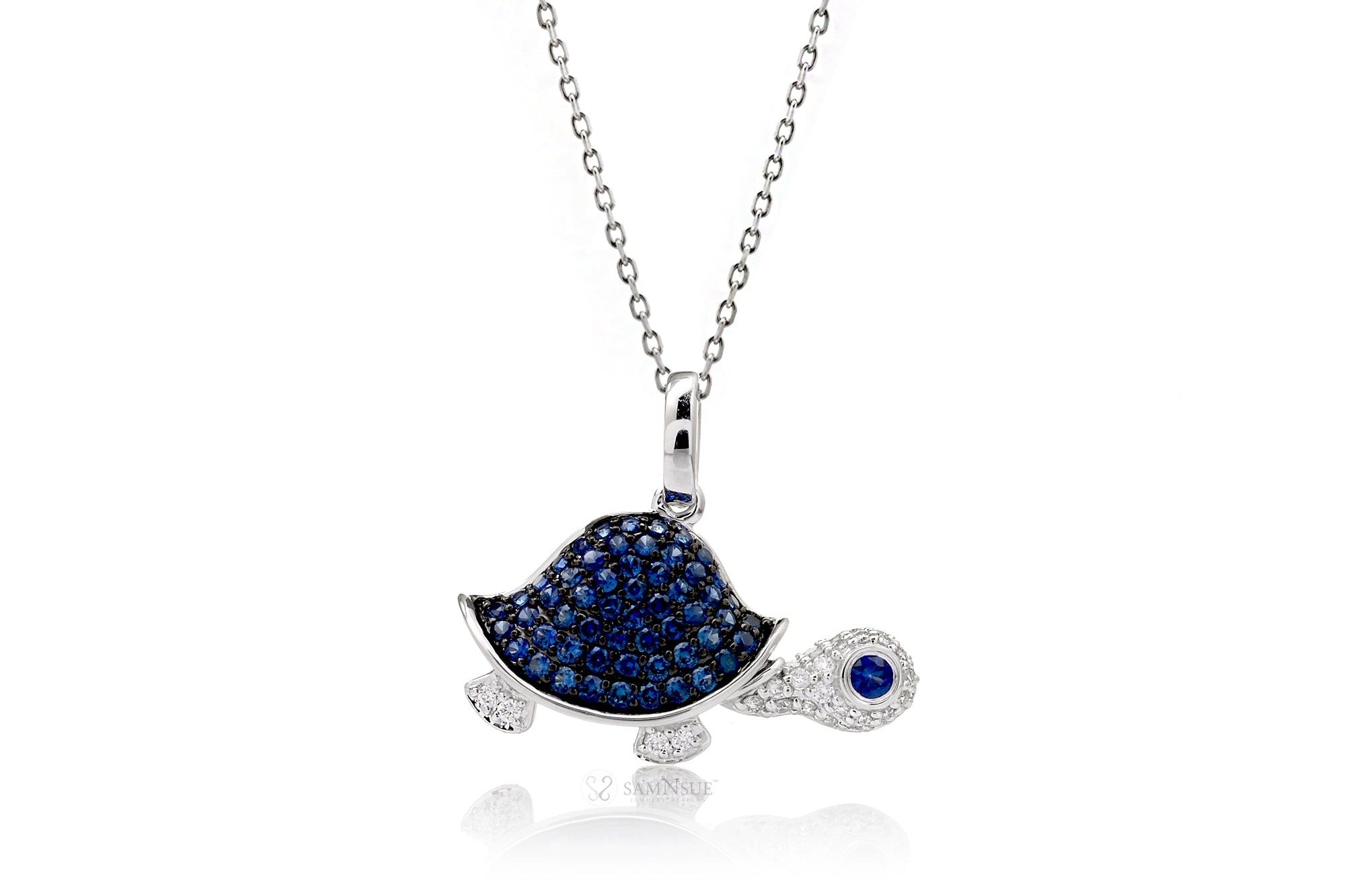Turtle necklace with blue sapphire in white gold